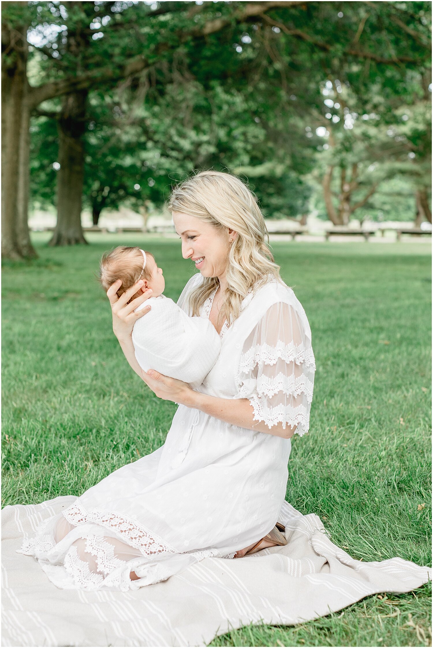 Mama and baby during newborn photos with Kristin Wood Photography.