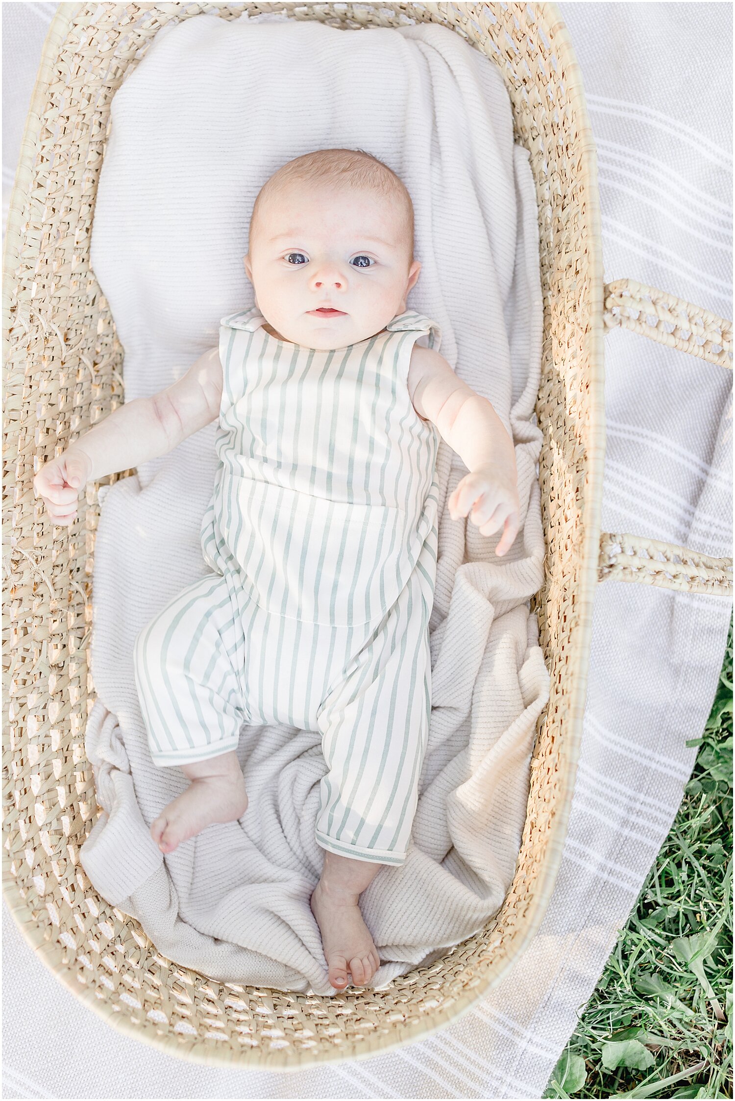Outdoor newborn photoshoot using Moses basket. Photos by Connecticut Baby Photographer, Kristin Wood Photography.