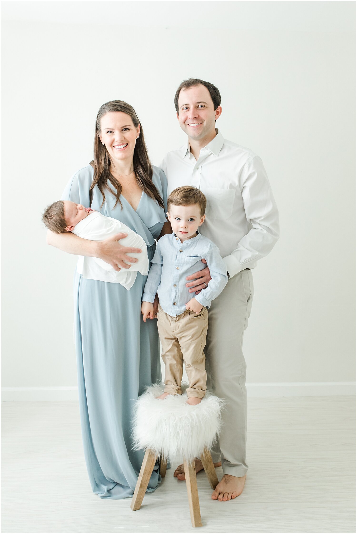 Family newborn photos in Darien, CT Newborn Studio. Photos by Kristin Wood Photography.