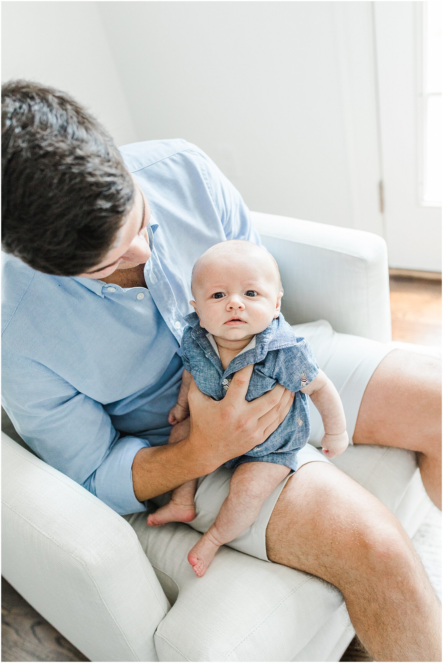 Newborn photos with baby + Dad. Photos by New Canaan Newborn Photographer, Kristin Wood Photography. 