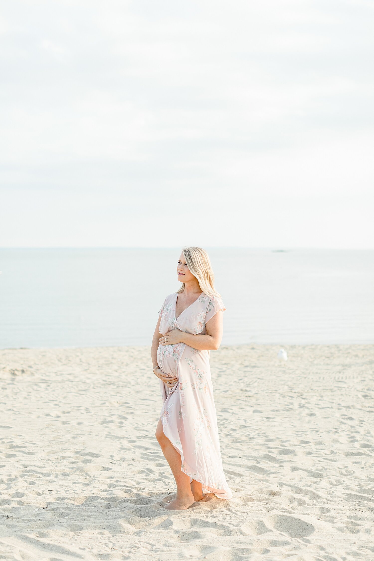 Beach maternity session. Photos taken by Darien Maternity Photographer, Kristin Wood Photography.