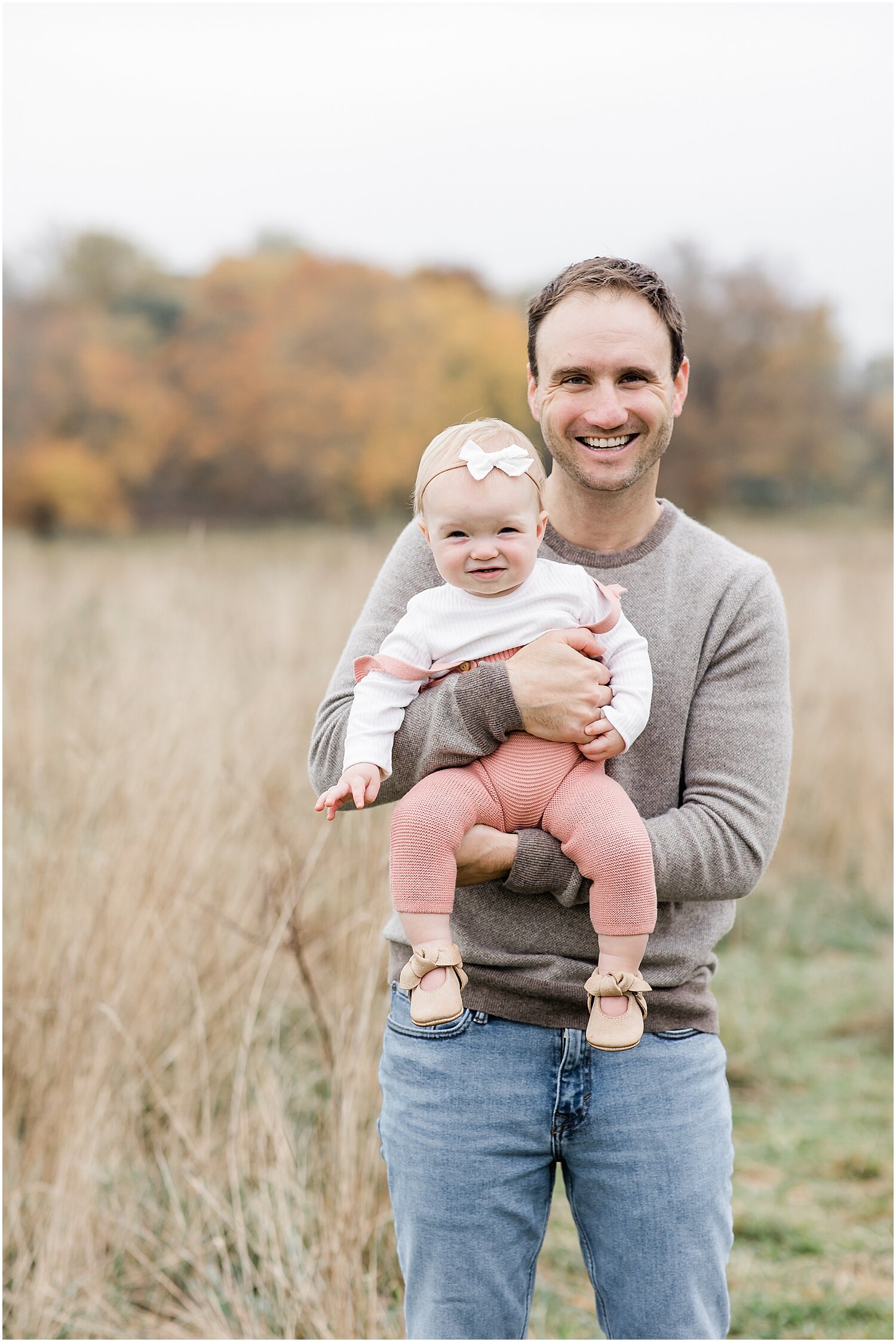 Daddy and baby girl at first birthday photoshoot in New Canaan, CT. Photos by CT Family Photographer, Kristin Wood Photography.