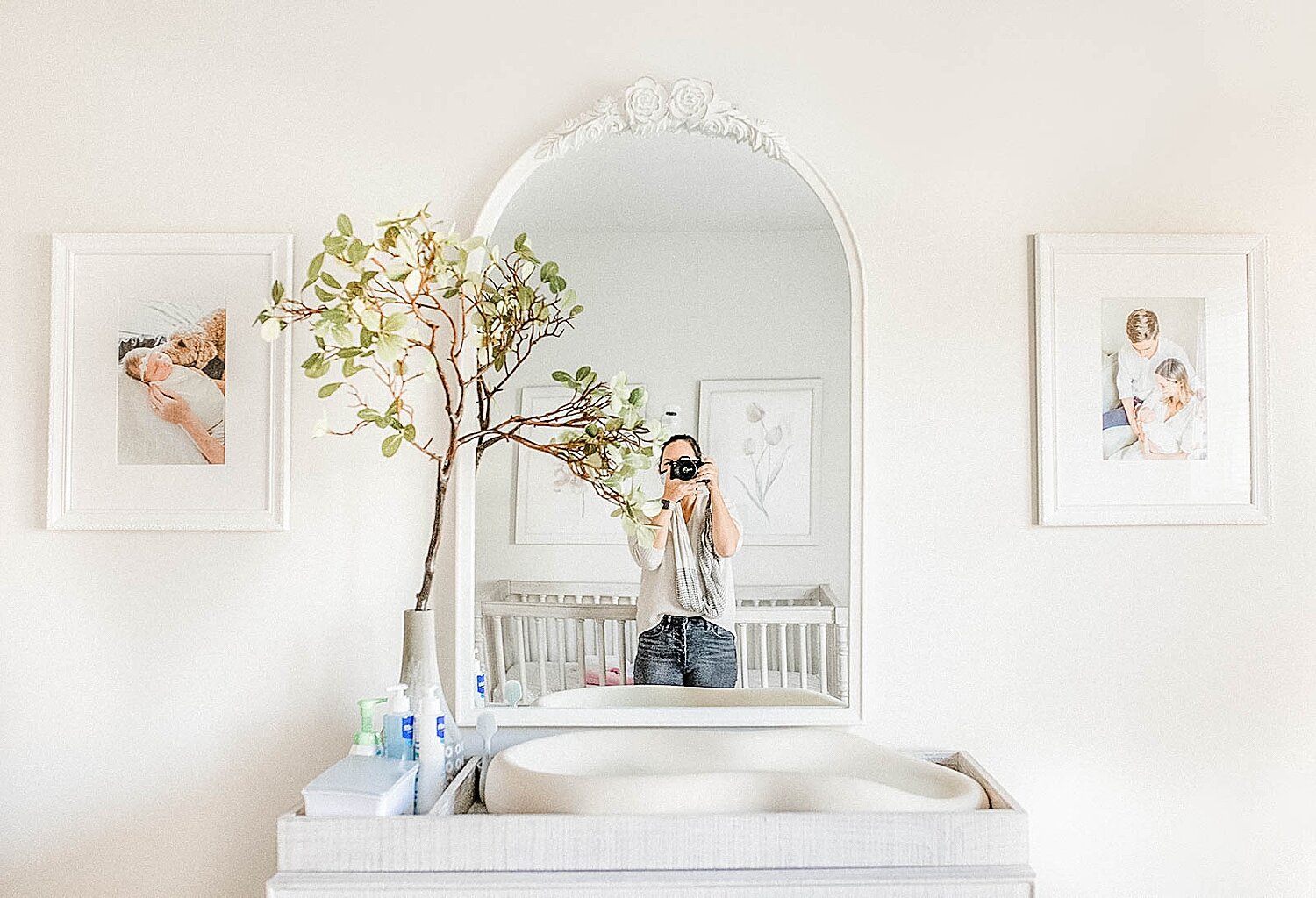 Beautiful newborn photos framed in baby's nursery. Photos and frame installation by Connecticut Newborn Photographer, Kristin Wood Photography.