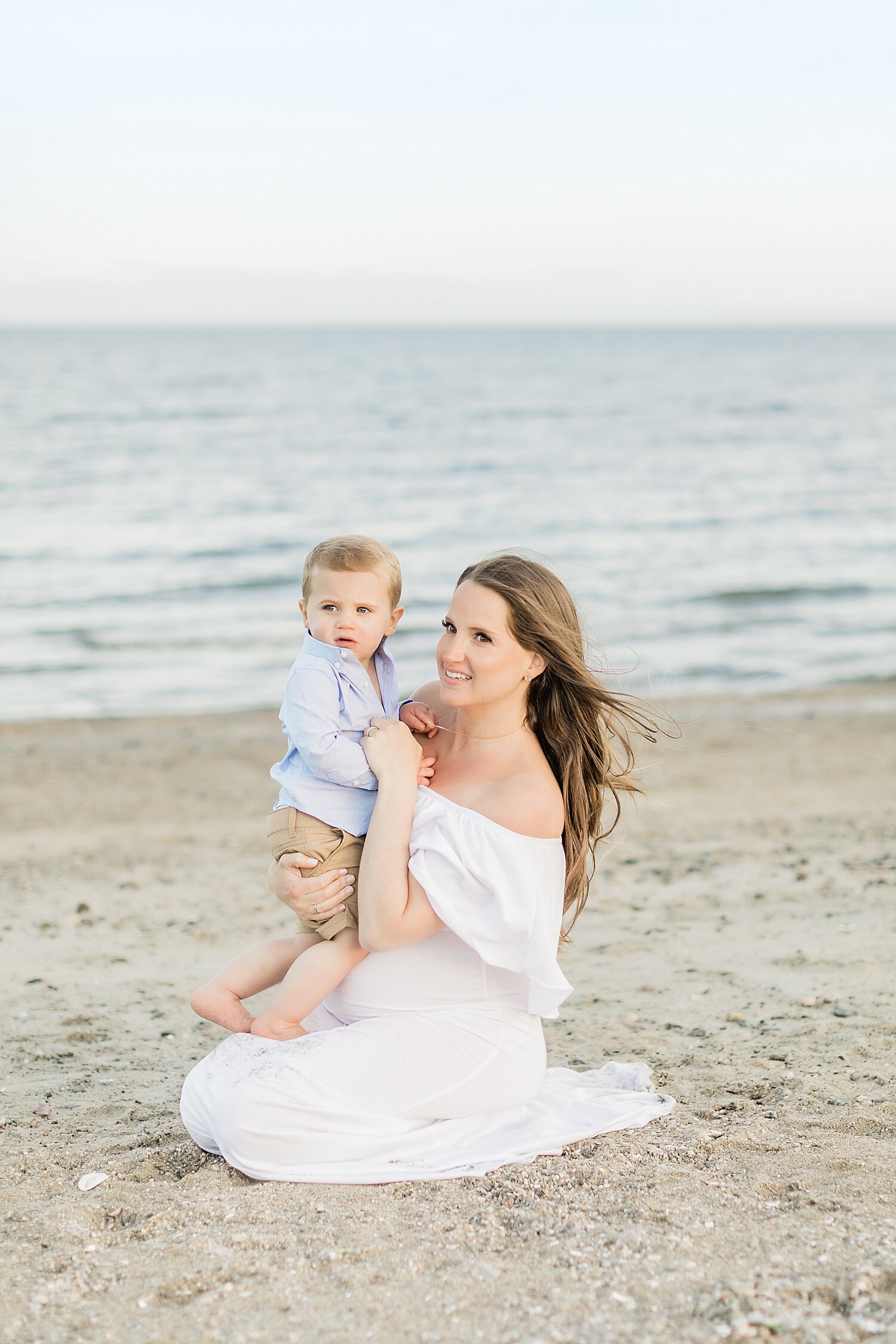 Mom and son together on the beach at Sherwood Island State Park. Photos by Photos by Kristin Wood Photography. 