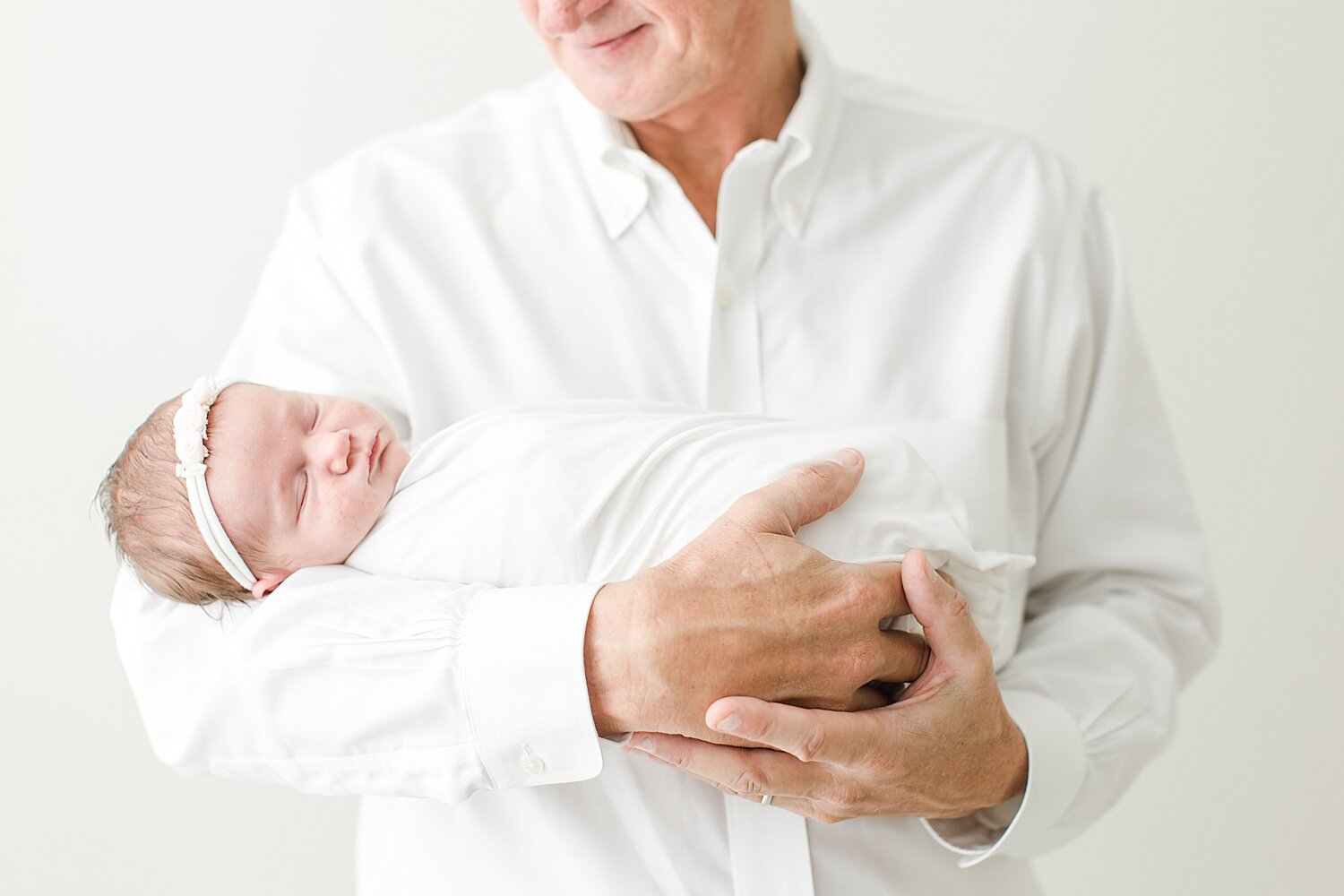 Newborn photo with baby and Dad photographed by CT Newborn Photographer, Kristin Wood Photography.