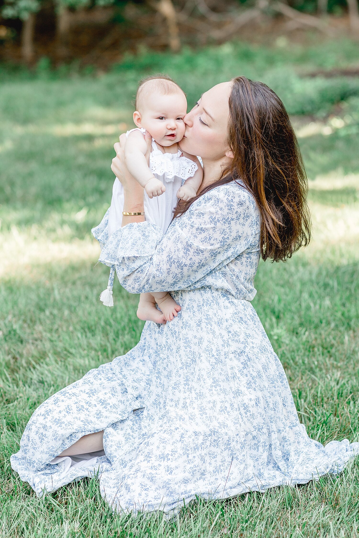 Photo of Mom and her baby girl during a photoshoot in Darien, CT. Photos by Kristin Wood Photography.