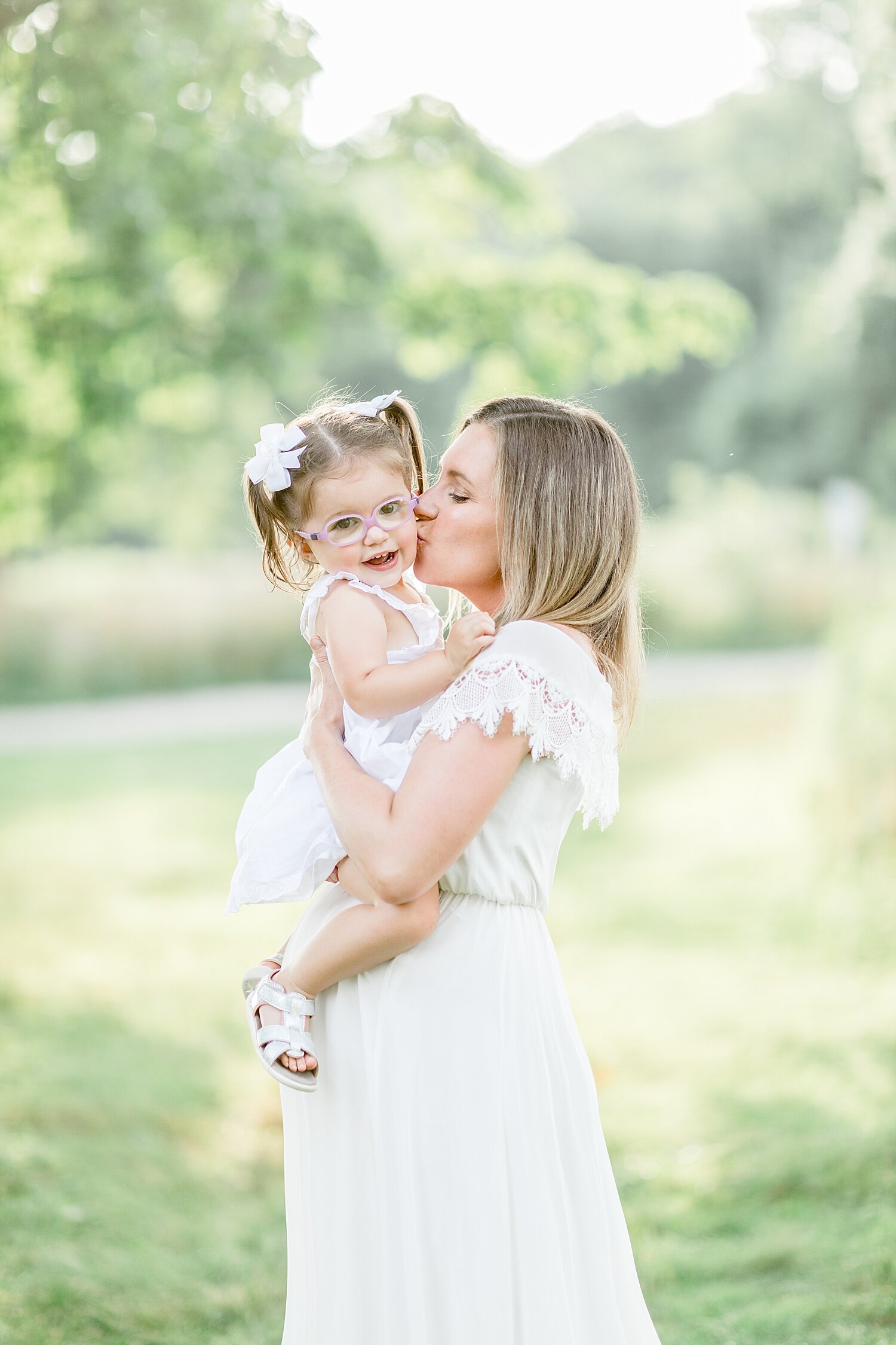 Photo of a pregnant mama and her baby girl. Photos by Darien Photographer, Kristin Wood Photography.