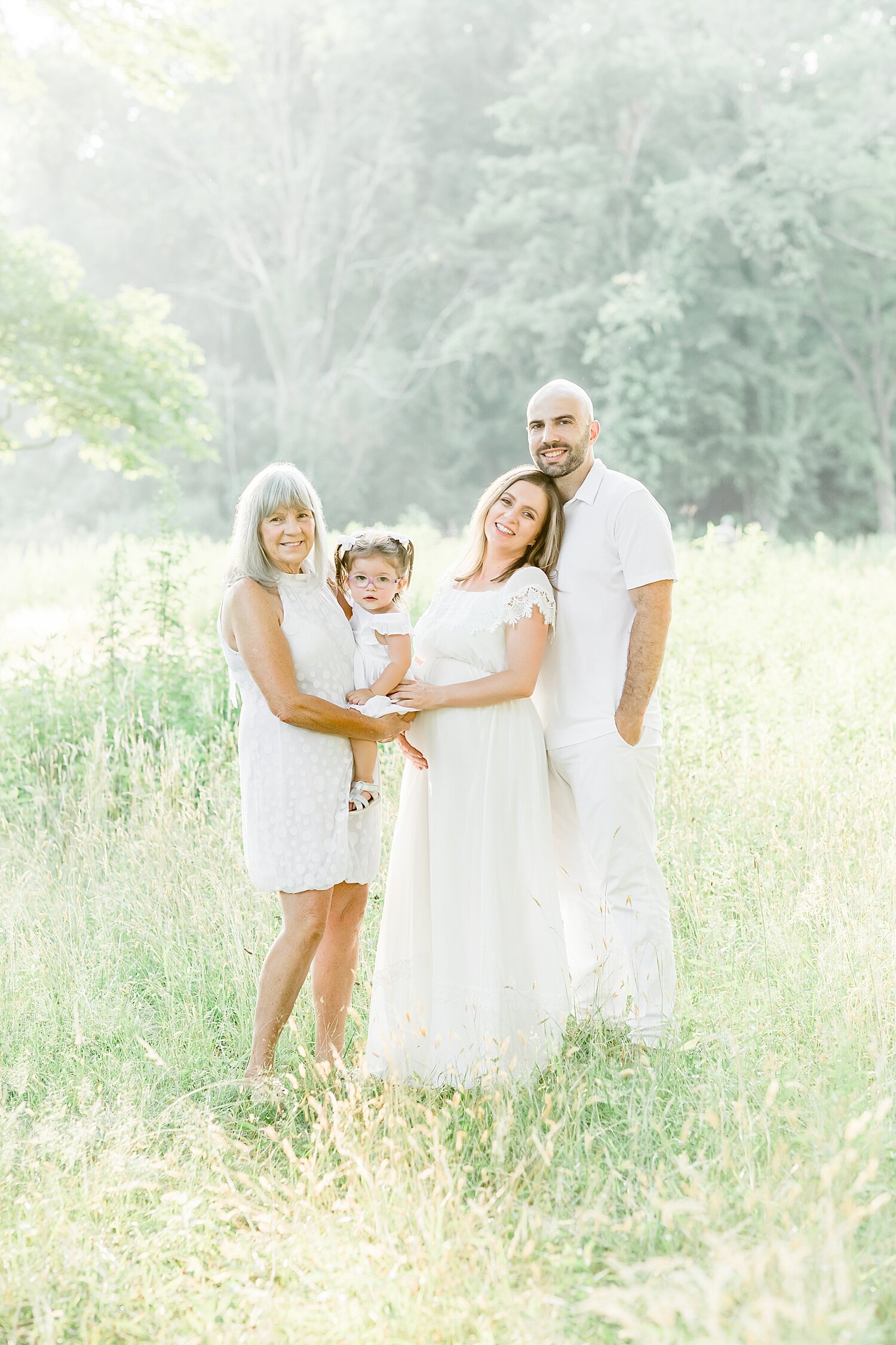 3 generations in one photo during family maternity session. Photos by Kristin Wood Photography. 