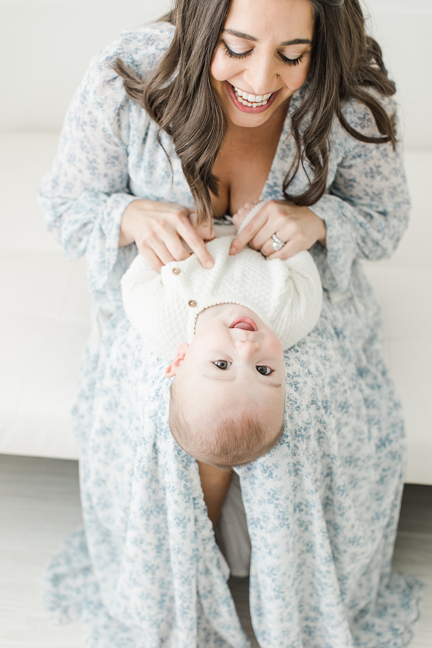 Mom and baby boy laughing together. Photos by Kristin Wood Photography.