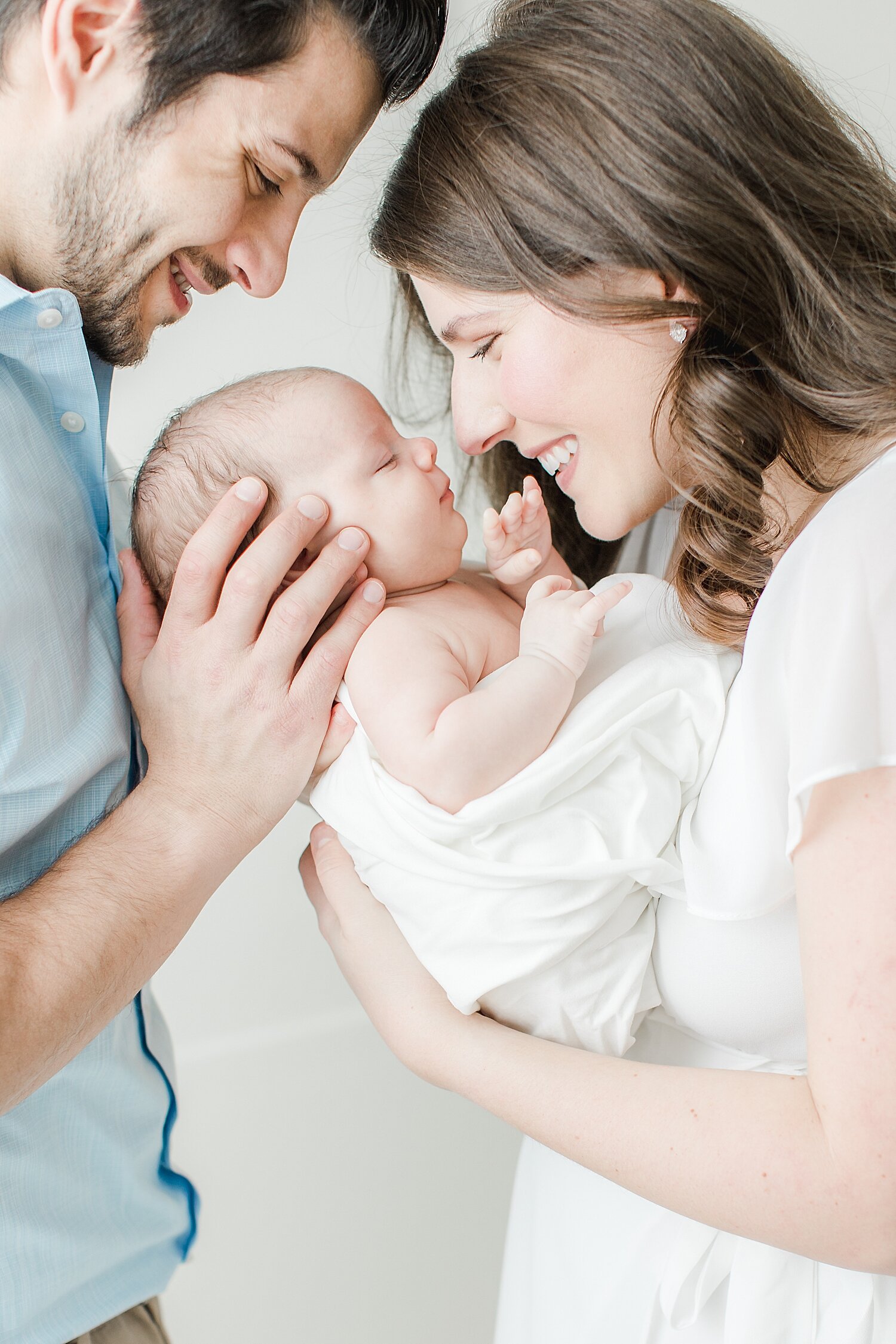 Mom and Dad with their newborn son | Kristin Wood Photography