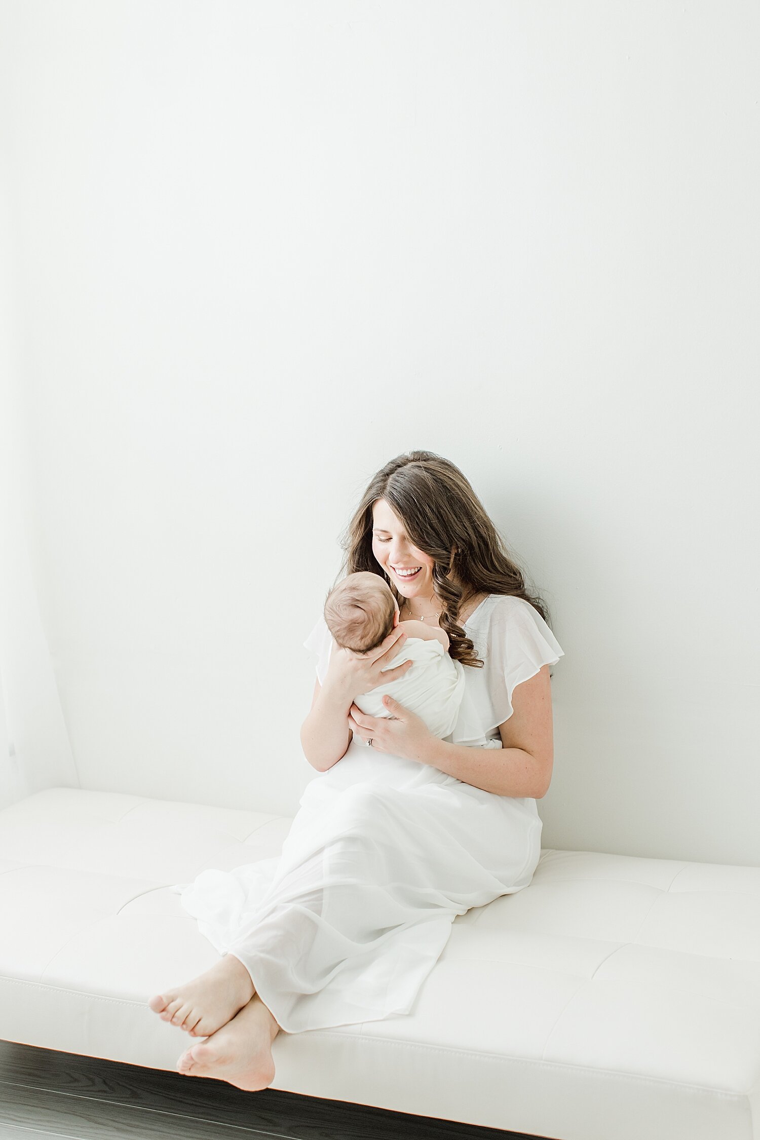 Motherhood photo of new mama and baby boy. Photos by Kristin Wood Photography.