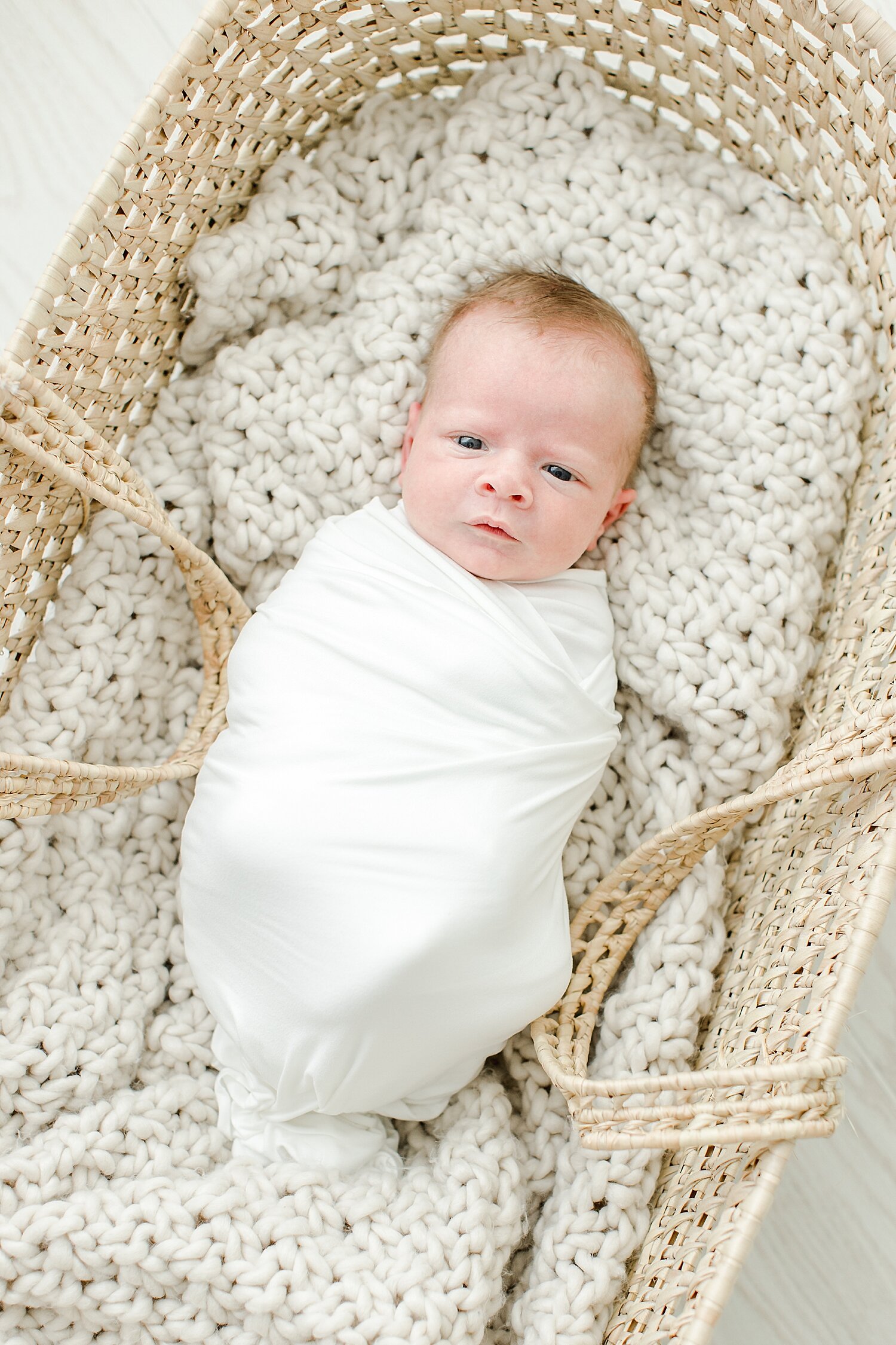 Baby swaddled in Moses Basket | Kristin Wood Photography
