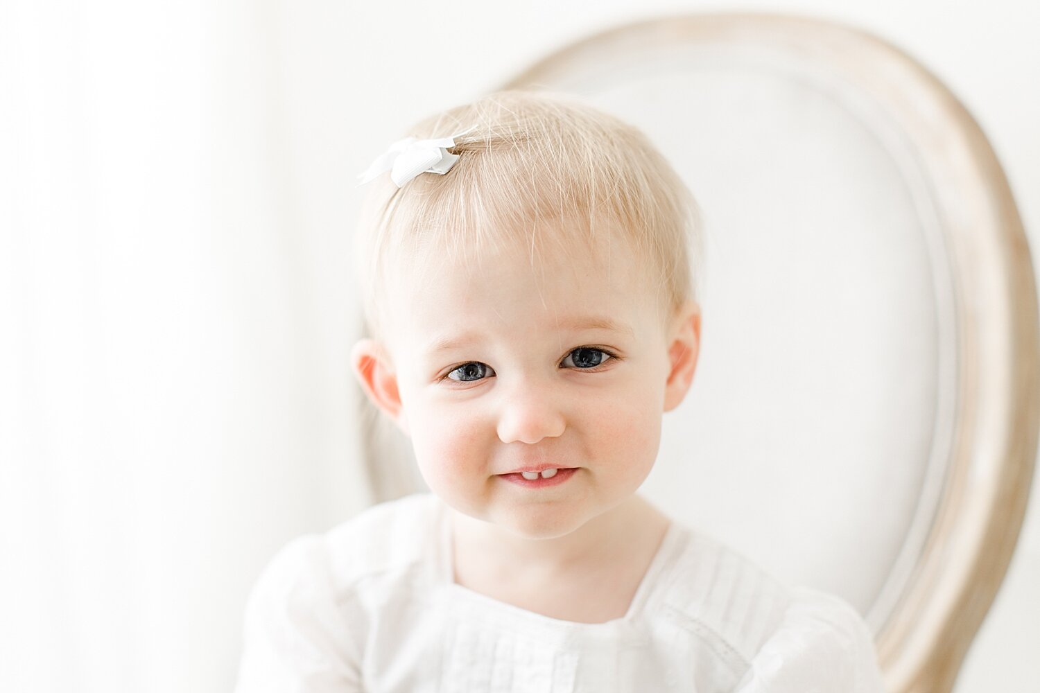 Classic portrait of 18 month old little girl. Photo by Kristin Wood Photography.