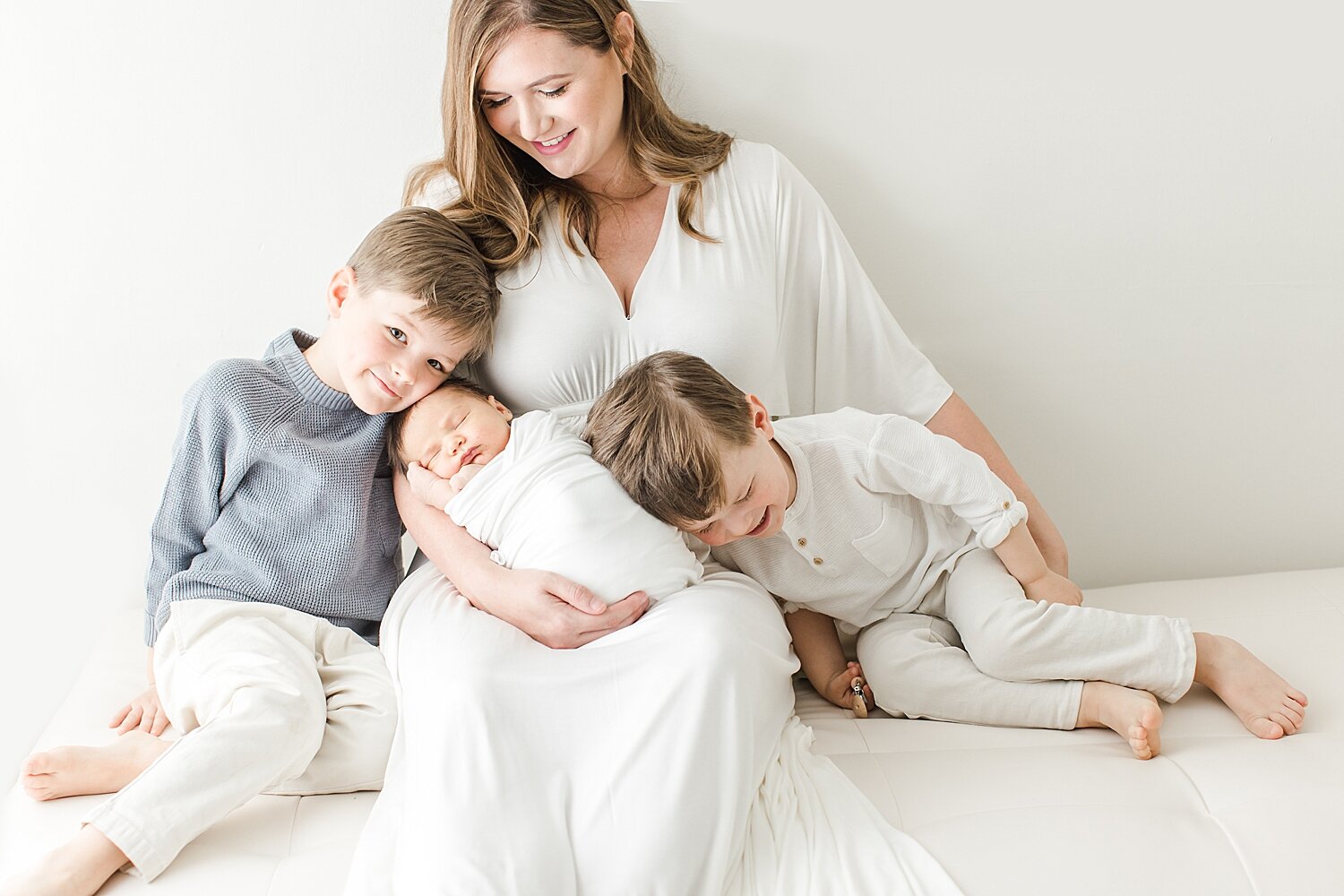 Mom and her three boys. Photo by CT Newborn Photographer, Kristin Wood Photography.