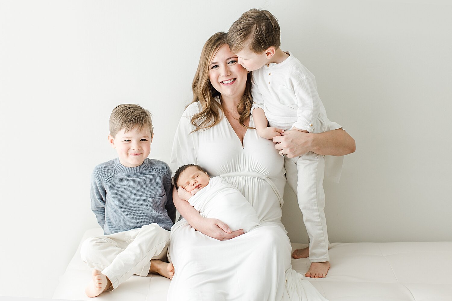Mom and her three boys. Photo by CT Newborn Photographer, Kristin Wood Photography.