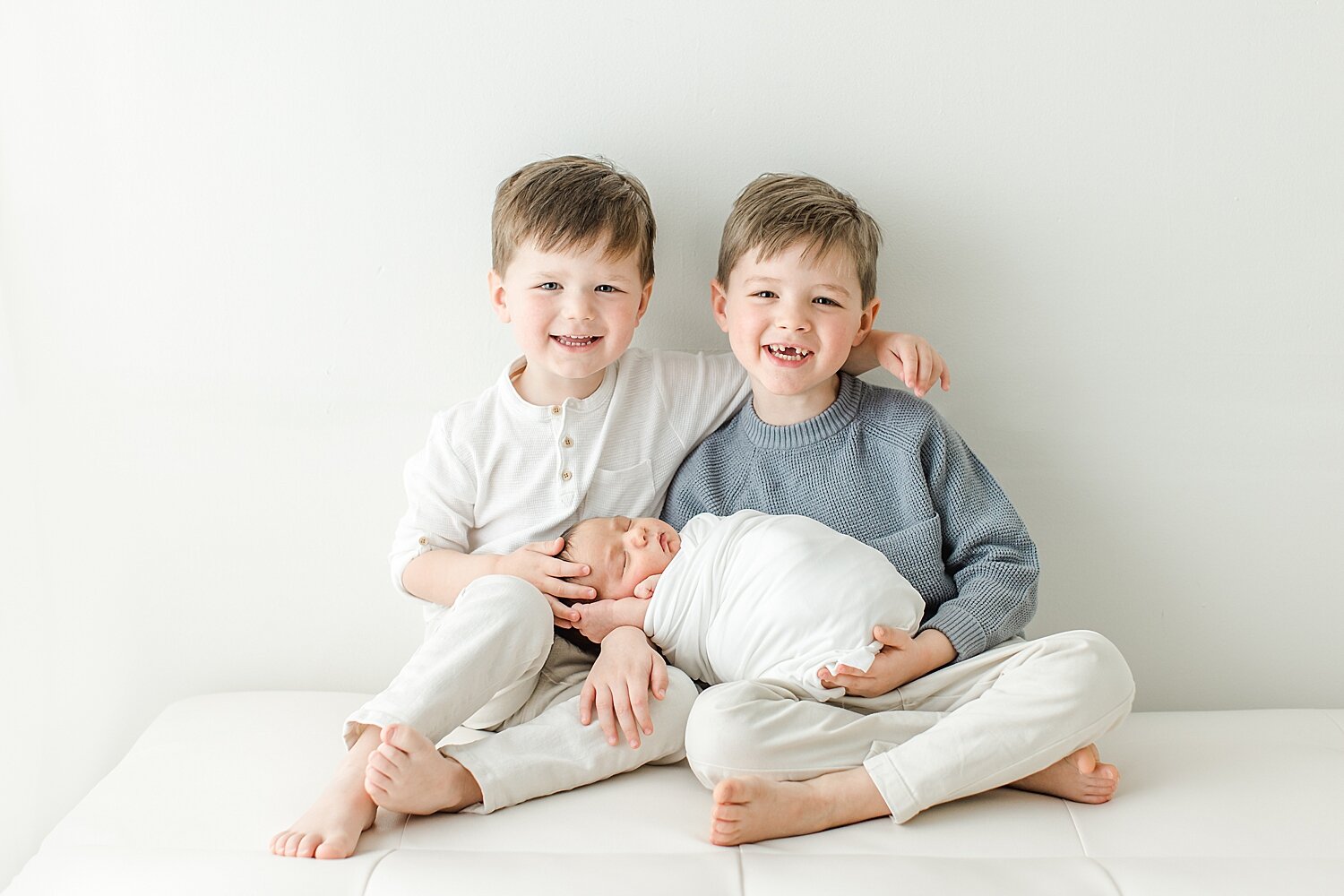 Sibling photo with three boys. Photo by CT Newborn Photographer, Kristin Wood Photography.