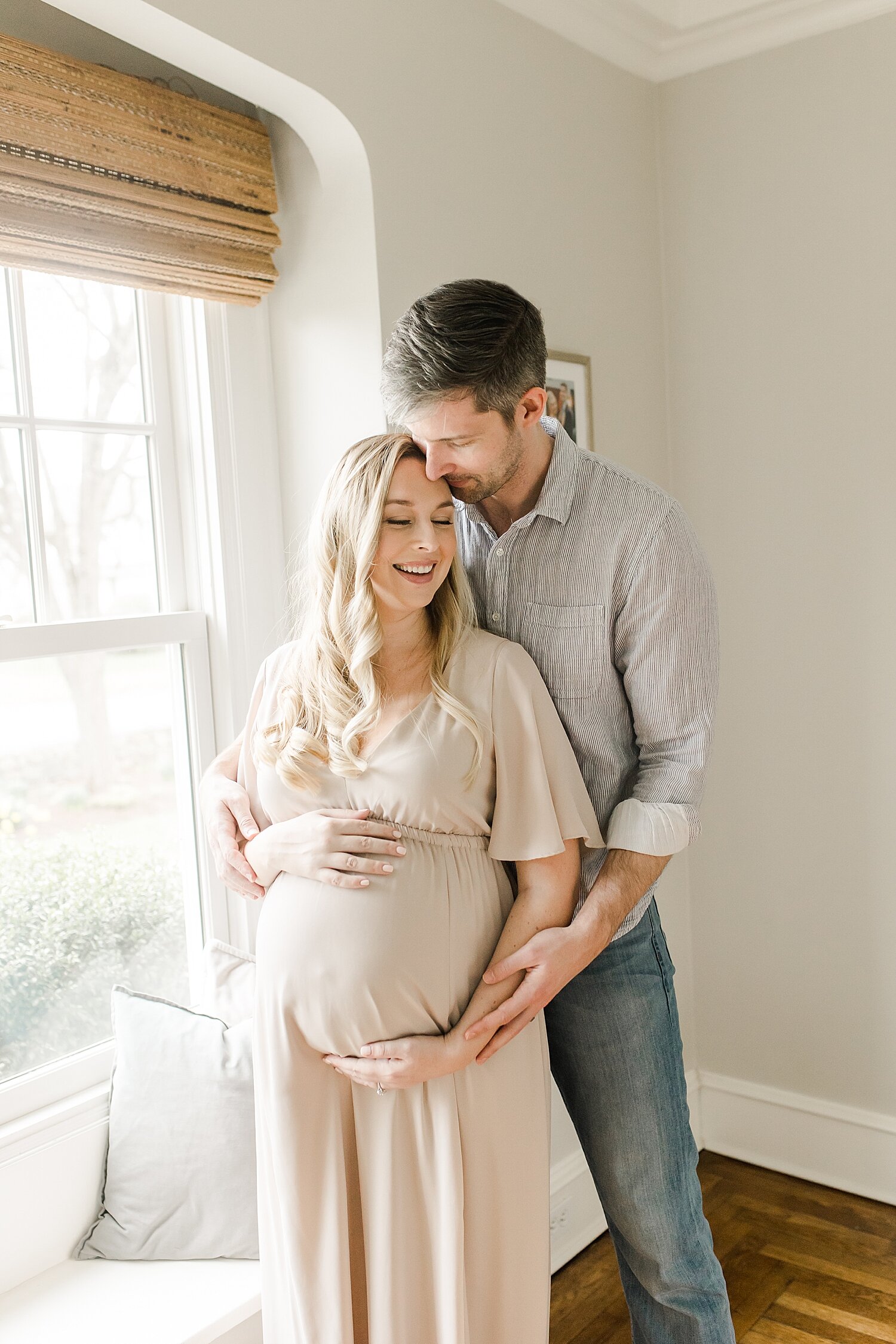 Lifestyle maternity session in parents home in Samford, CT. Photo by Kristin Wood Photography.