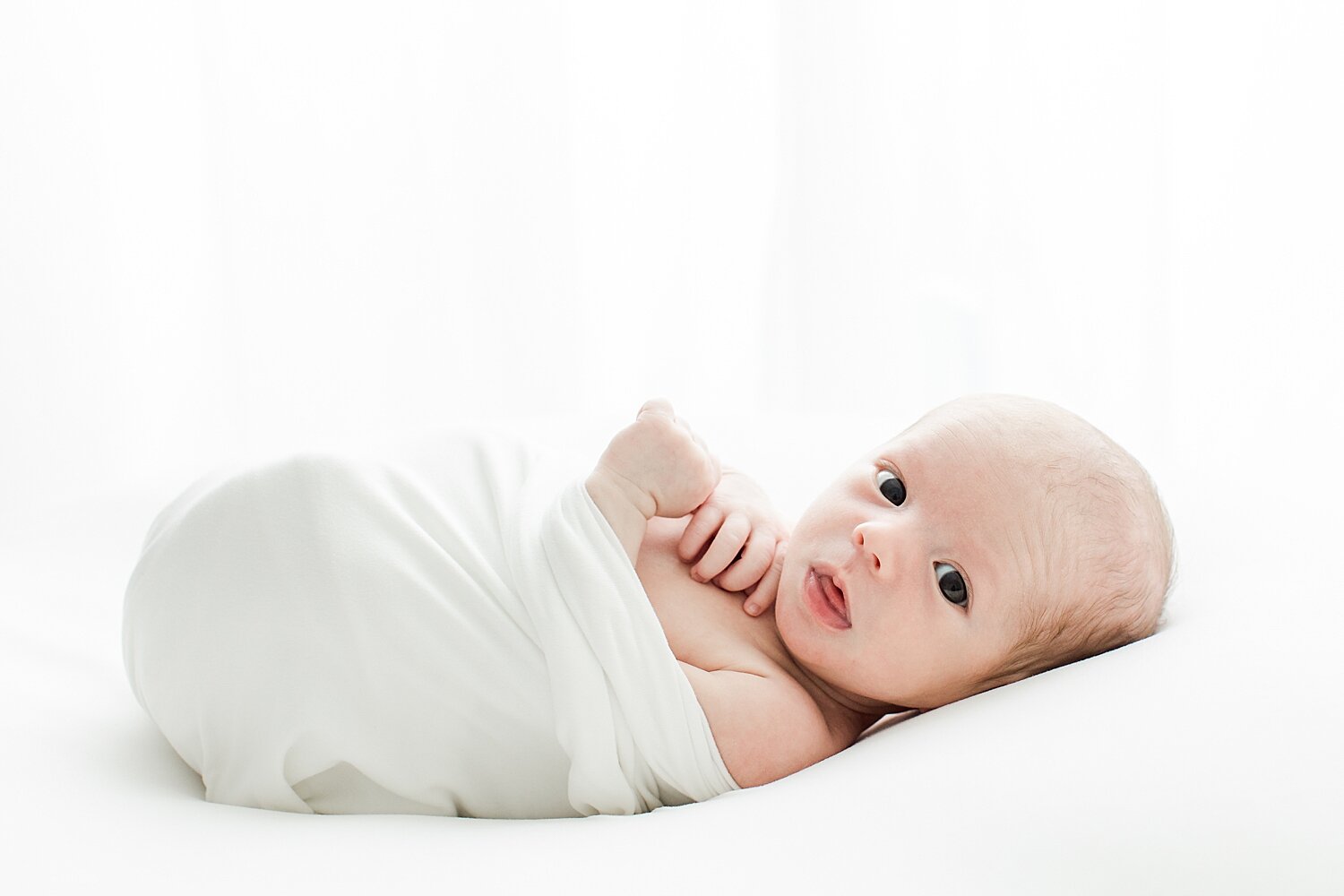 Classic newborn photo in Darien, CT studio. Photo by Kristin Wood Photography.