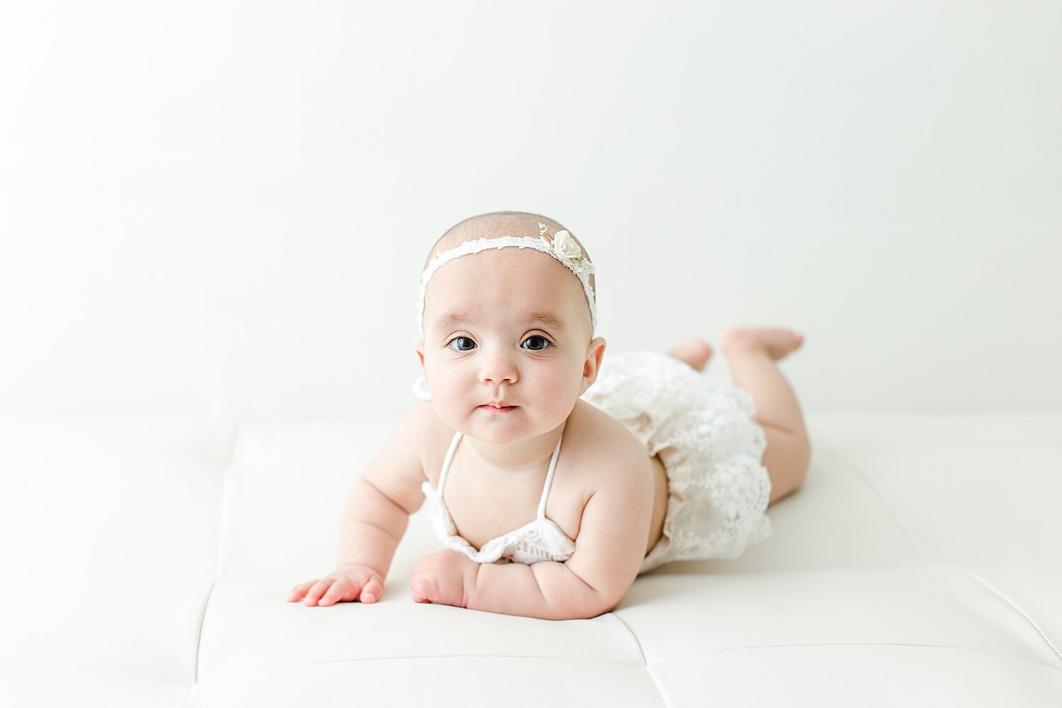 Eight month old baby girl sitter session. Photo by Kristin Wood Photography. 