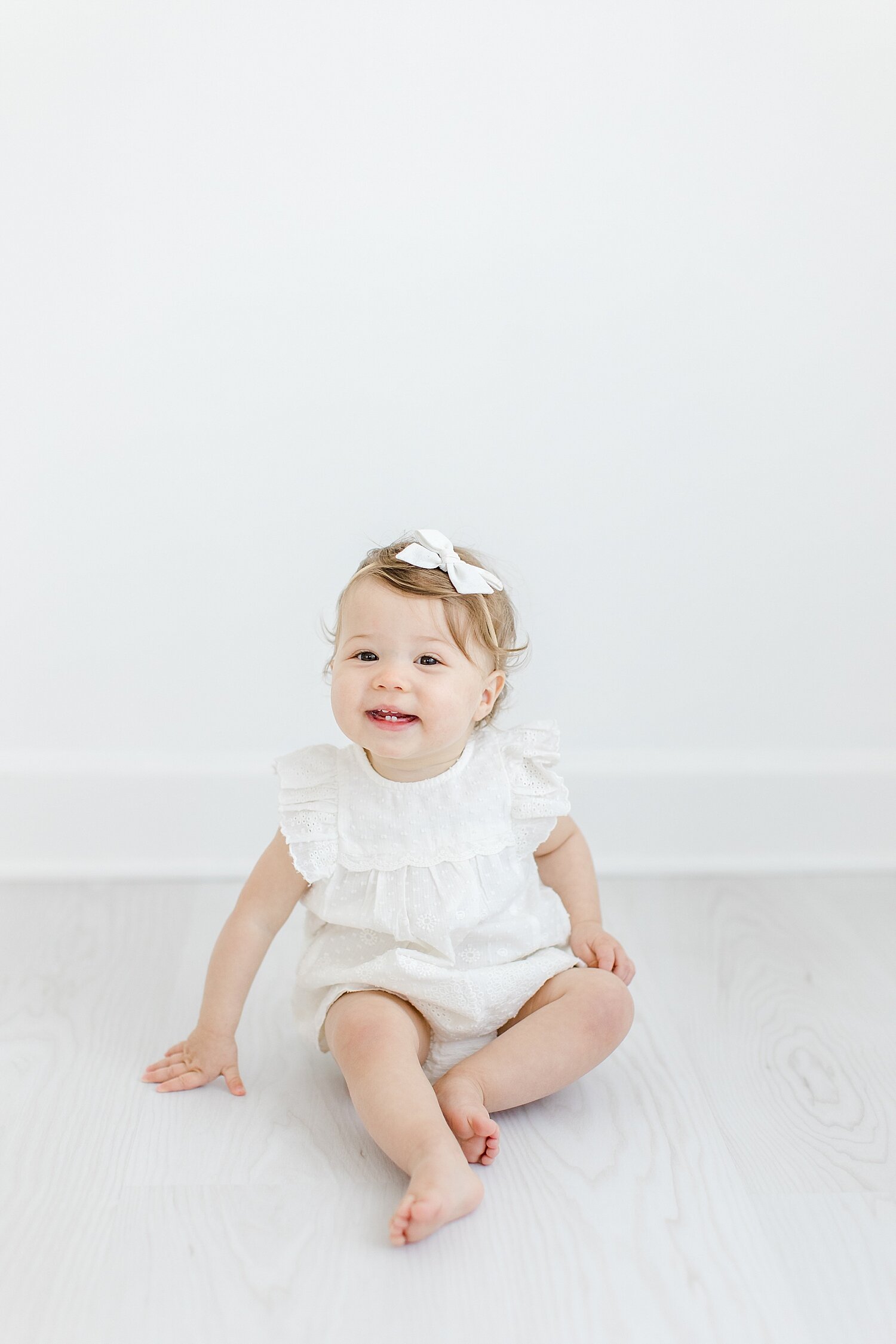 Classic one-year-old photos and cake smash session in Westport Studio. Photo by Kristin Wood Photography.