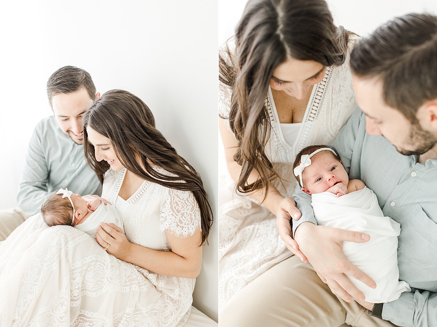 Parents sitting on couch in studio in Westport admiring newborn baby girl | Kristin Wood Photography