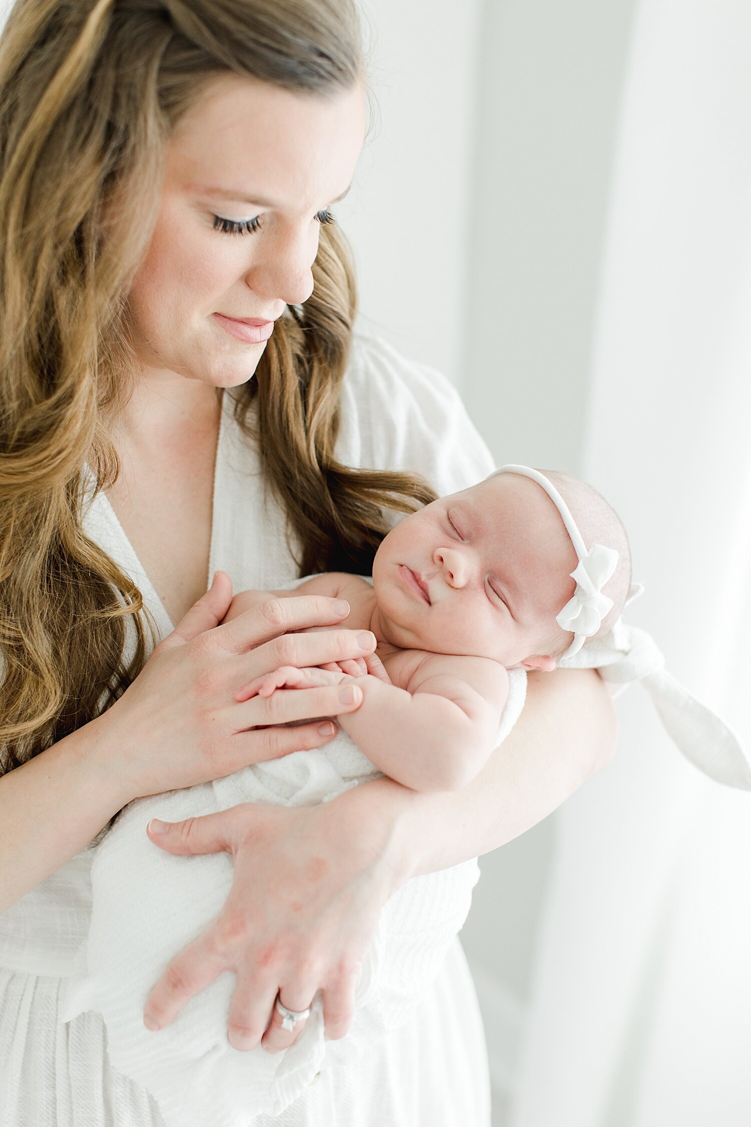 Mom holding her baby girl | Kristin Wood Photography