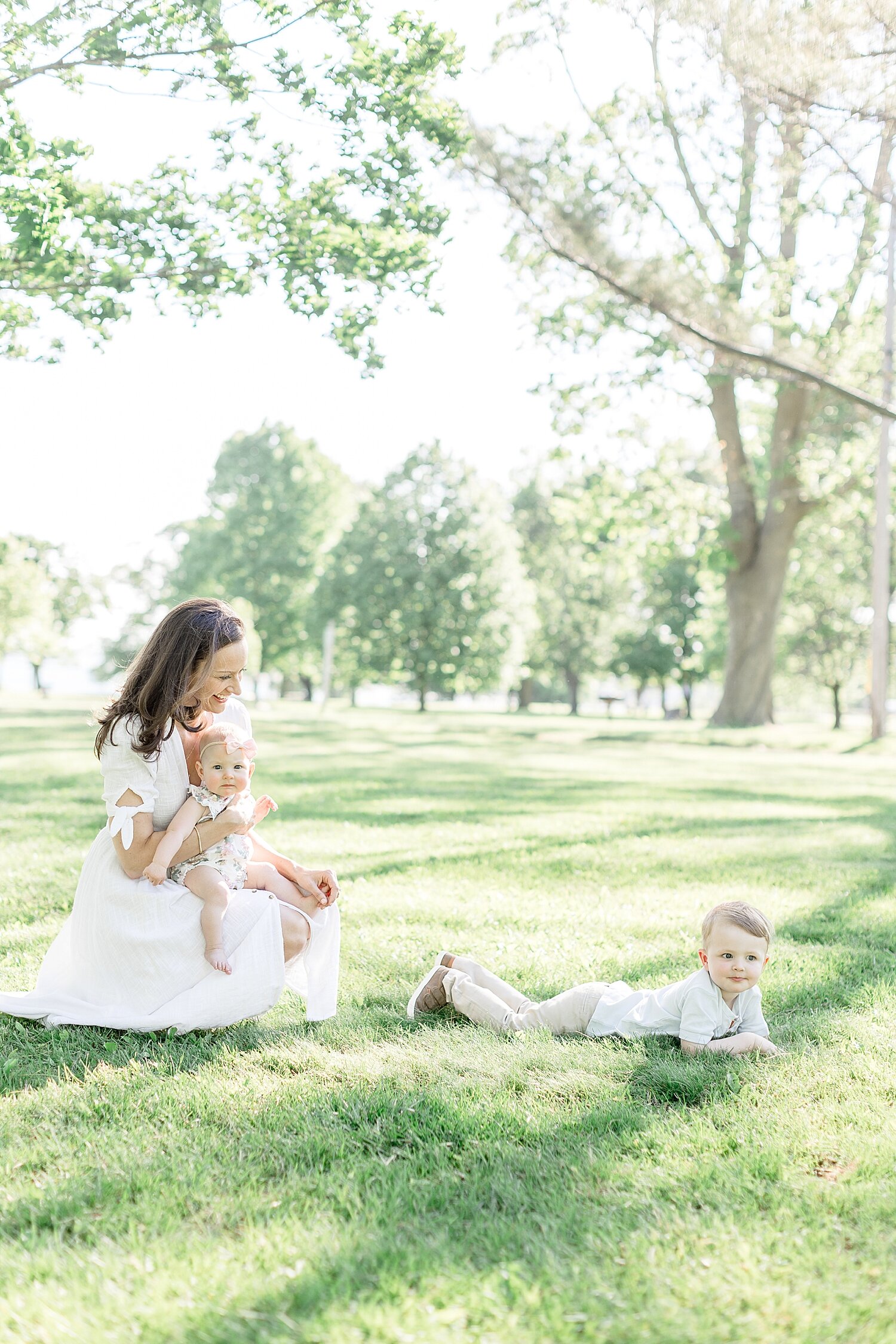 Mom and two kids playing in the field at Sherwood Island State Park | Kristin Wood Photography