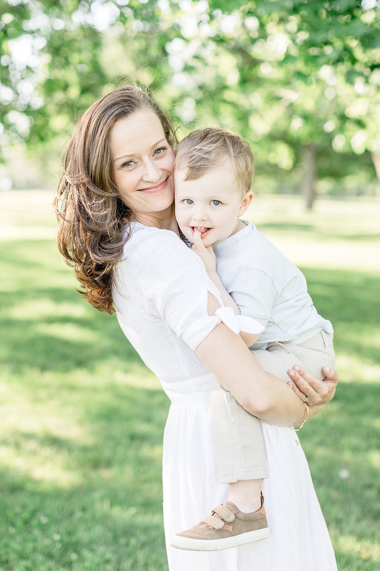 Mom and son during family portraits at Sherwood Island | Kristin Wood Photography