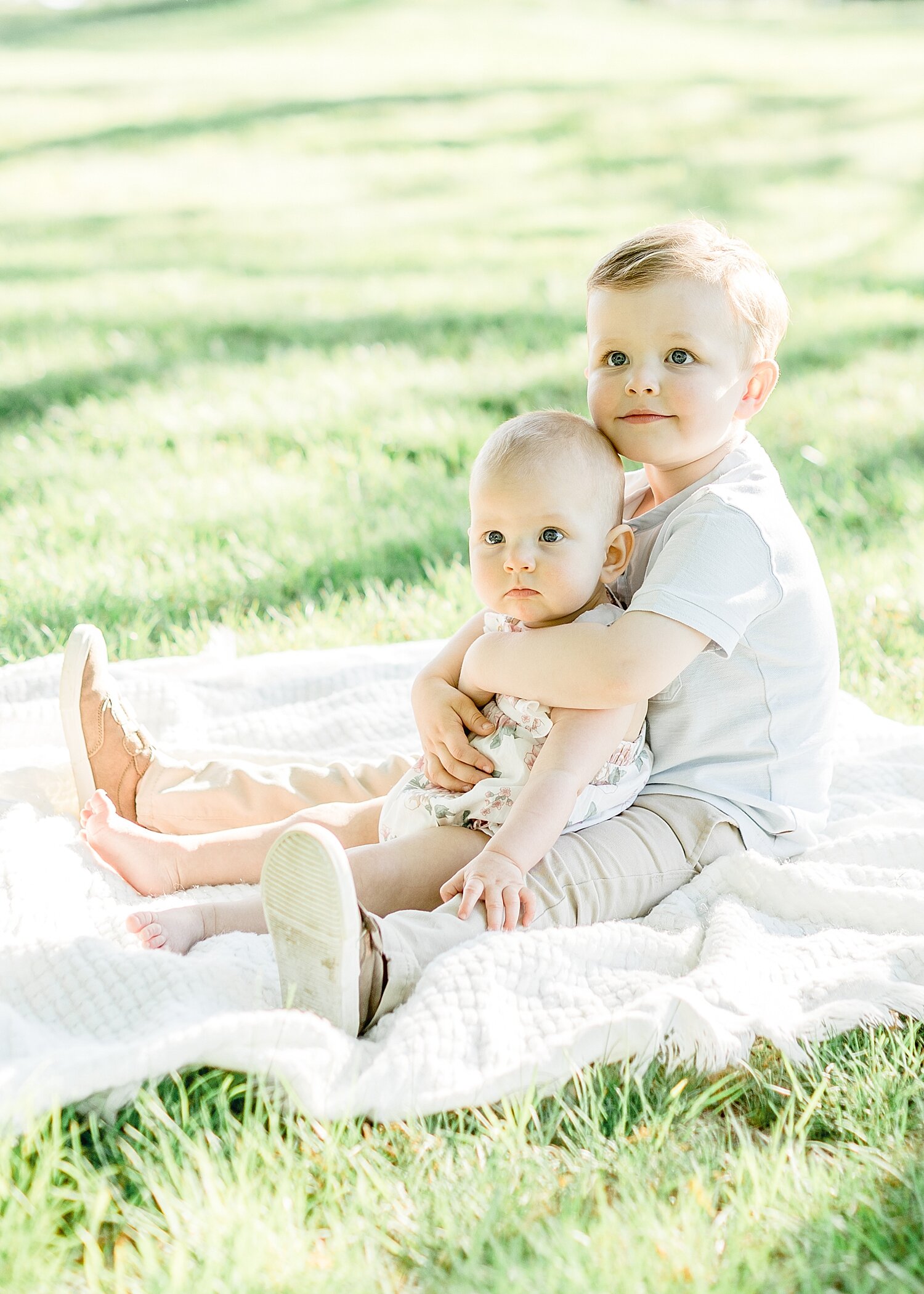Brother and sister sitting together | Kristin Wood Photography
