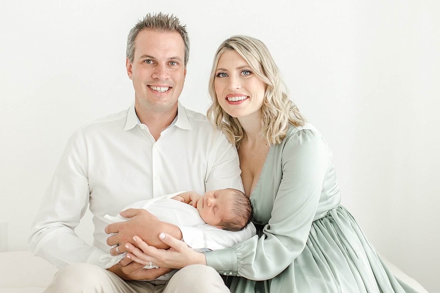 Family portrait with newborn son. Photo by Kristin Wood Photography.