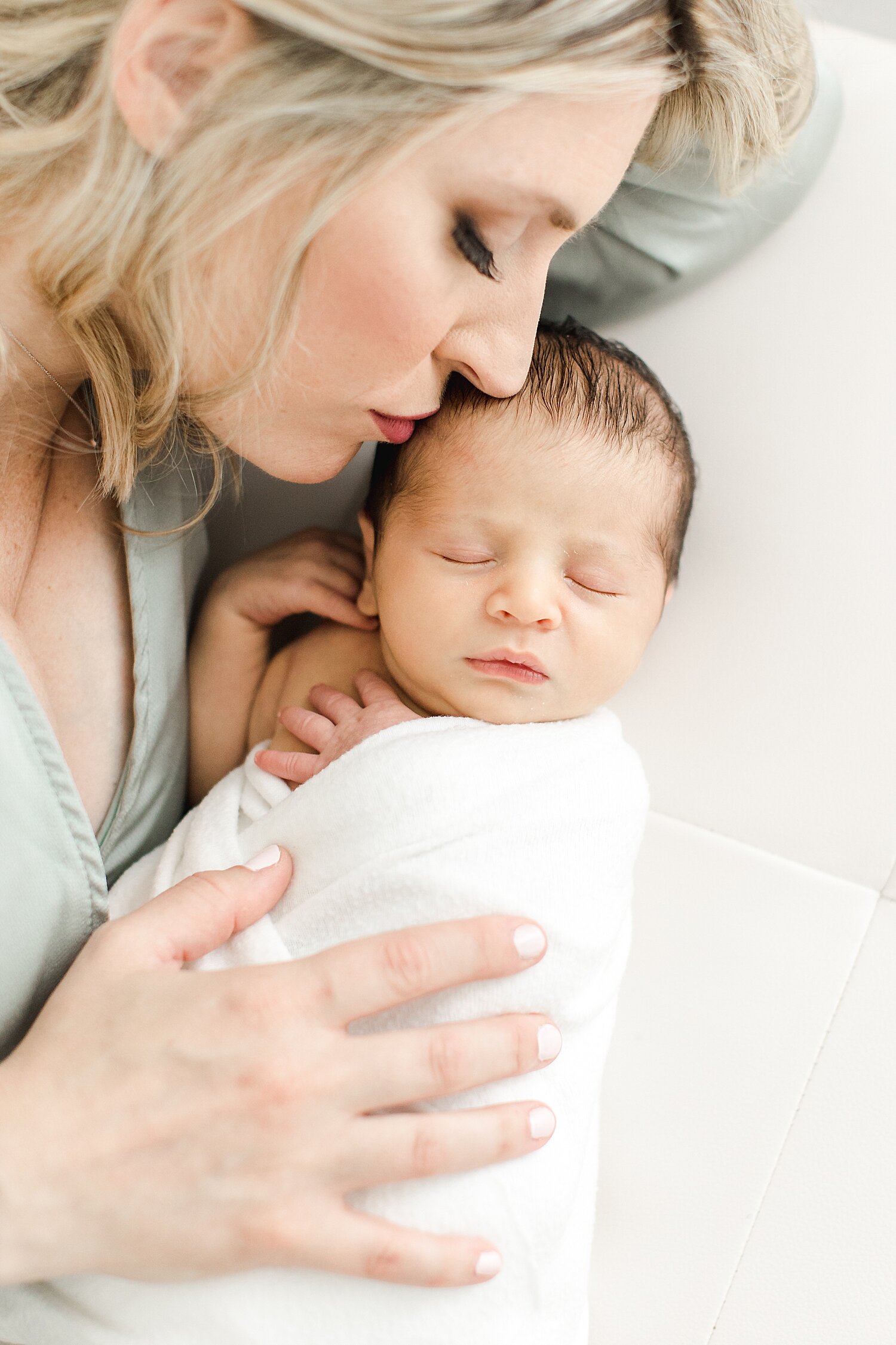 Newborn photos of mom and her son. Photo by CT Newborn Photographer, Kristin Wood Photography.