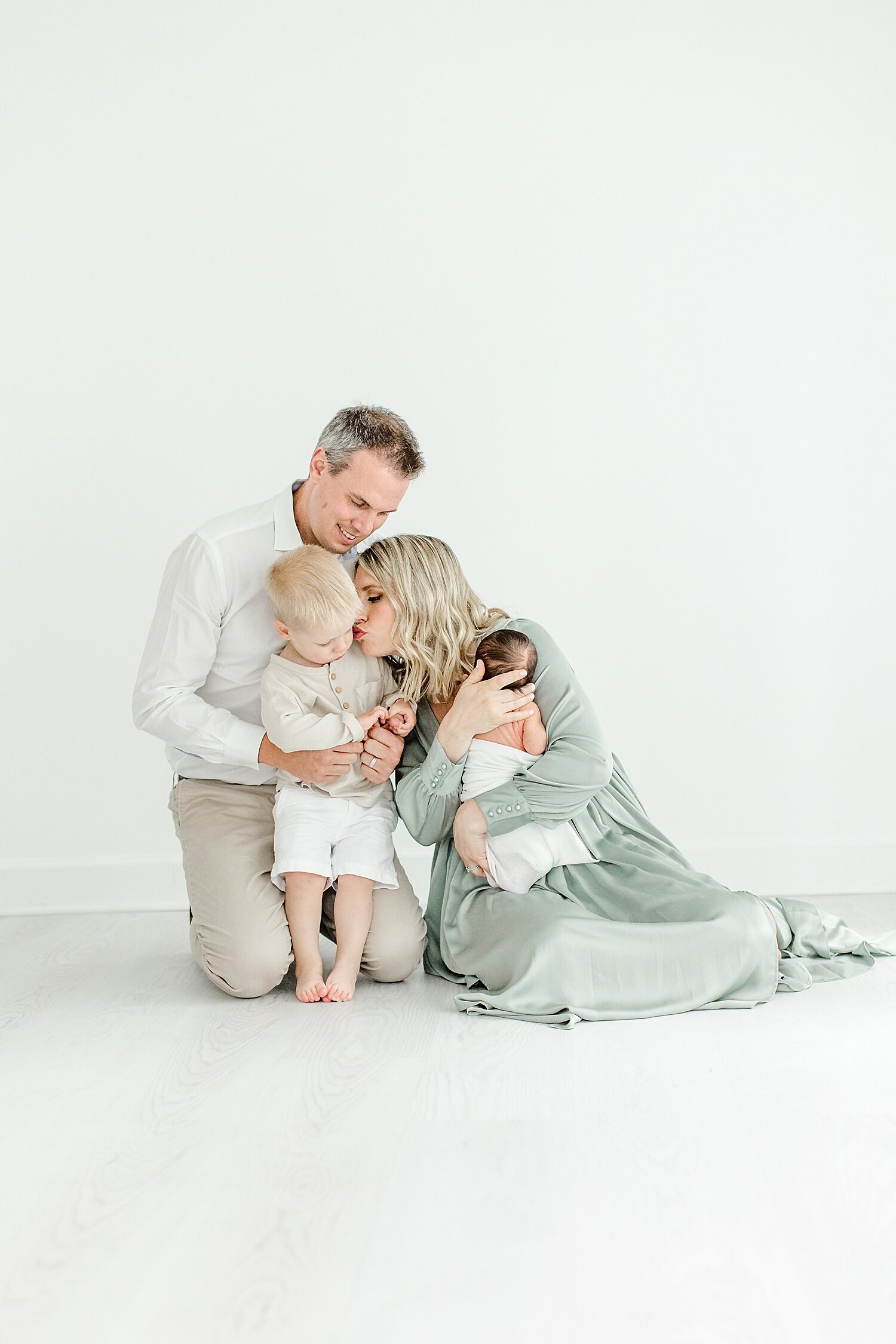 Family portraits for family of four during newborn session with Kristin Wood Photography in Westport, CT.