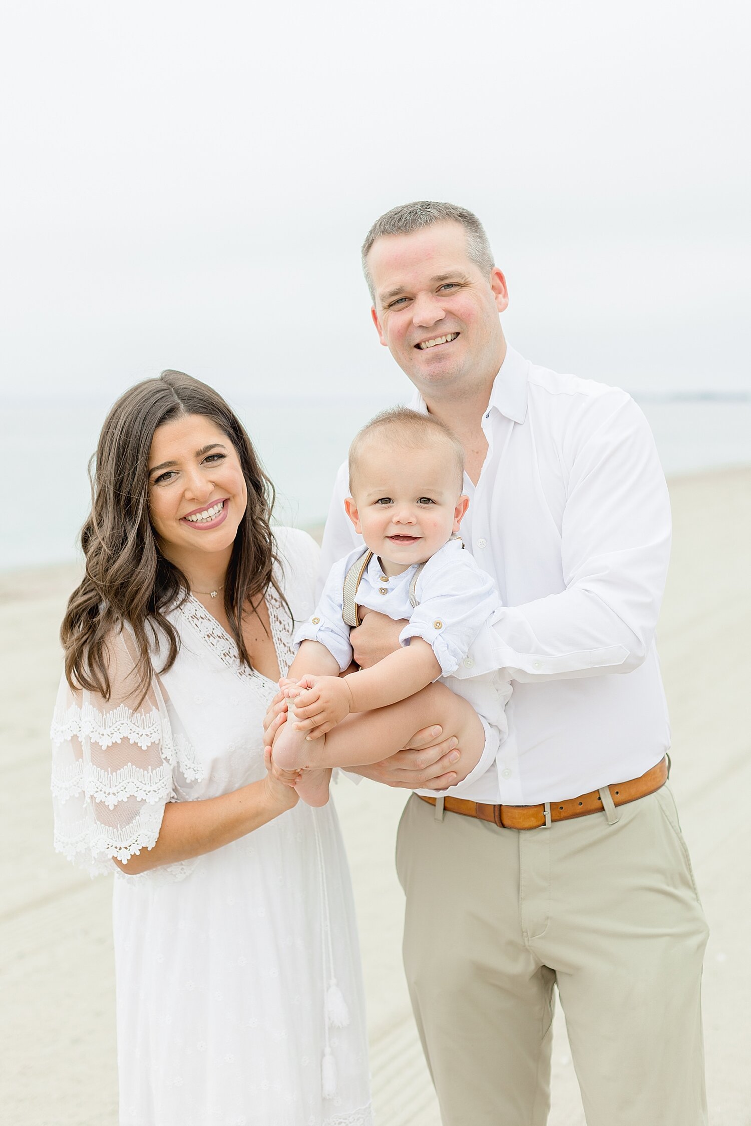Family photos on the beach for sons first birthday | Kristin Wood Photography