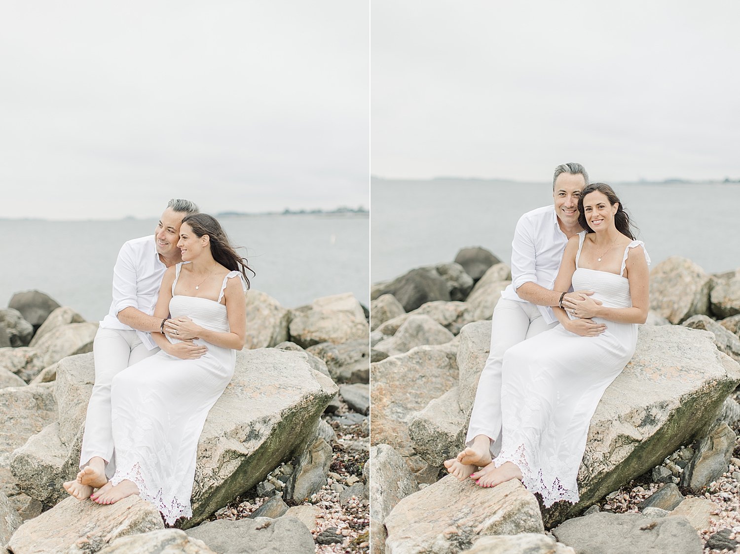Expecting parents sitting on rocks at Sherwood Island with Kristin Wood Photography, a maternity photographer in CT.