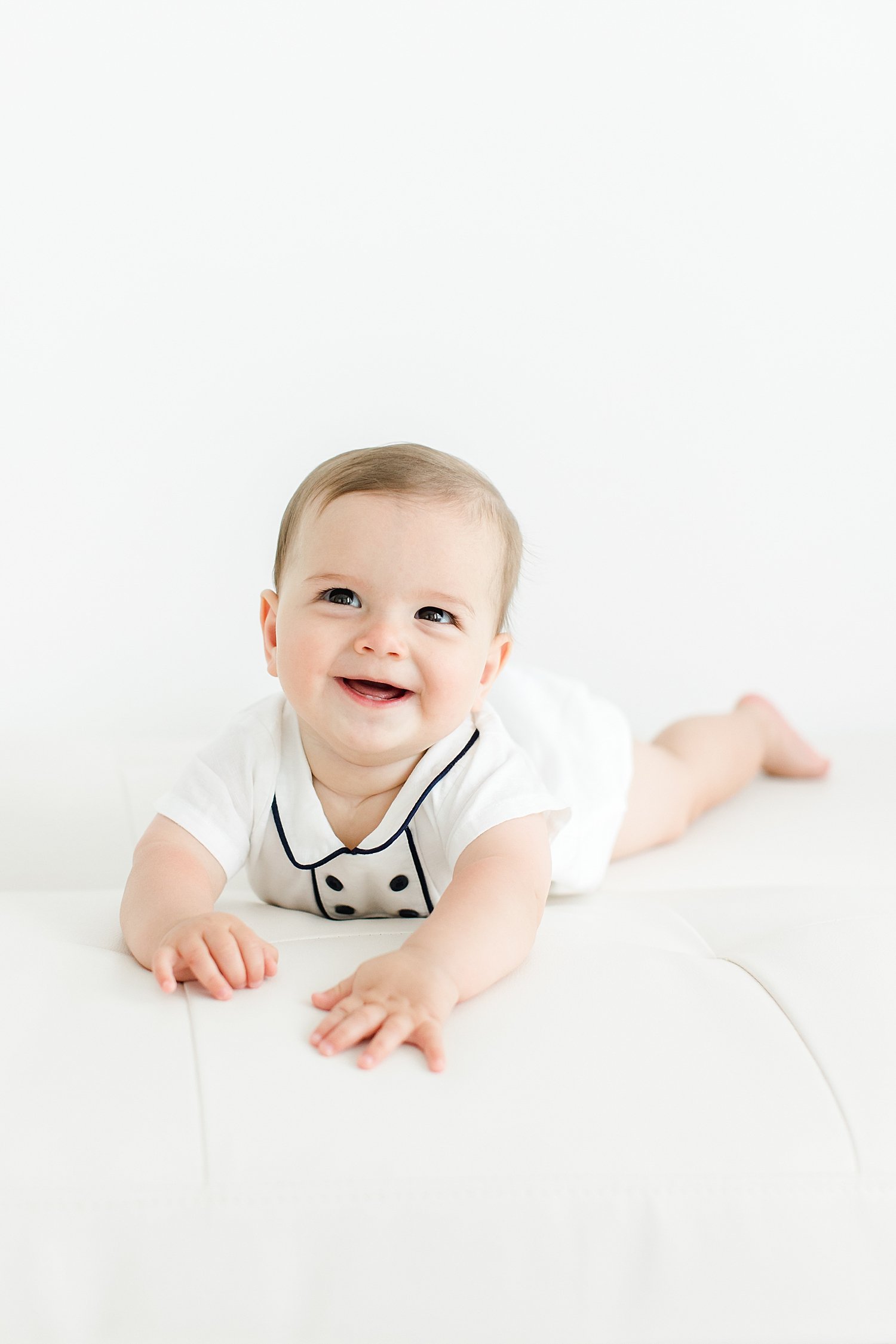 Milestone session for 8 month old baby boy in studio in Westport. Photo by Kristin Wood Photography.