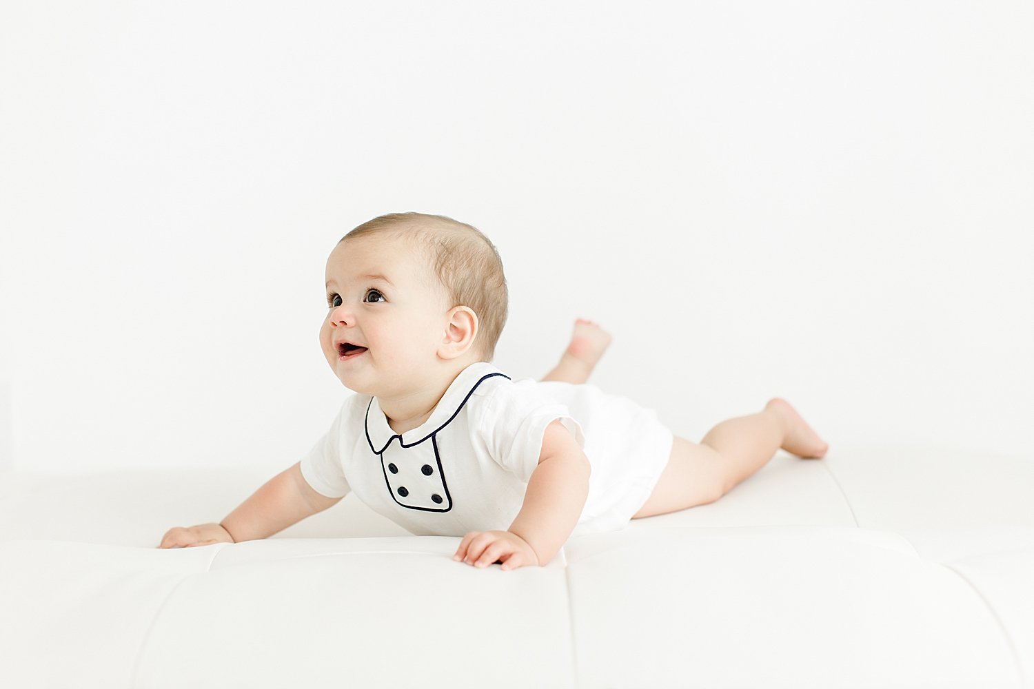 Milestone session for 8 month old baby boy in studio in Westport. Photo by Kristin Wood Photography.