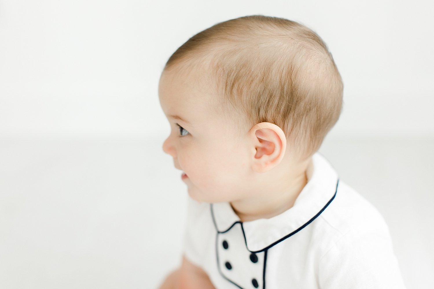 Children's portrait of eight month old. Photo by Kristin Wood Photography.