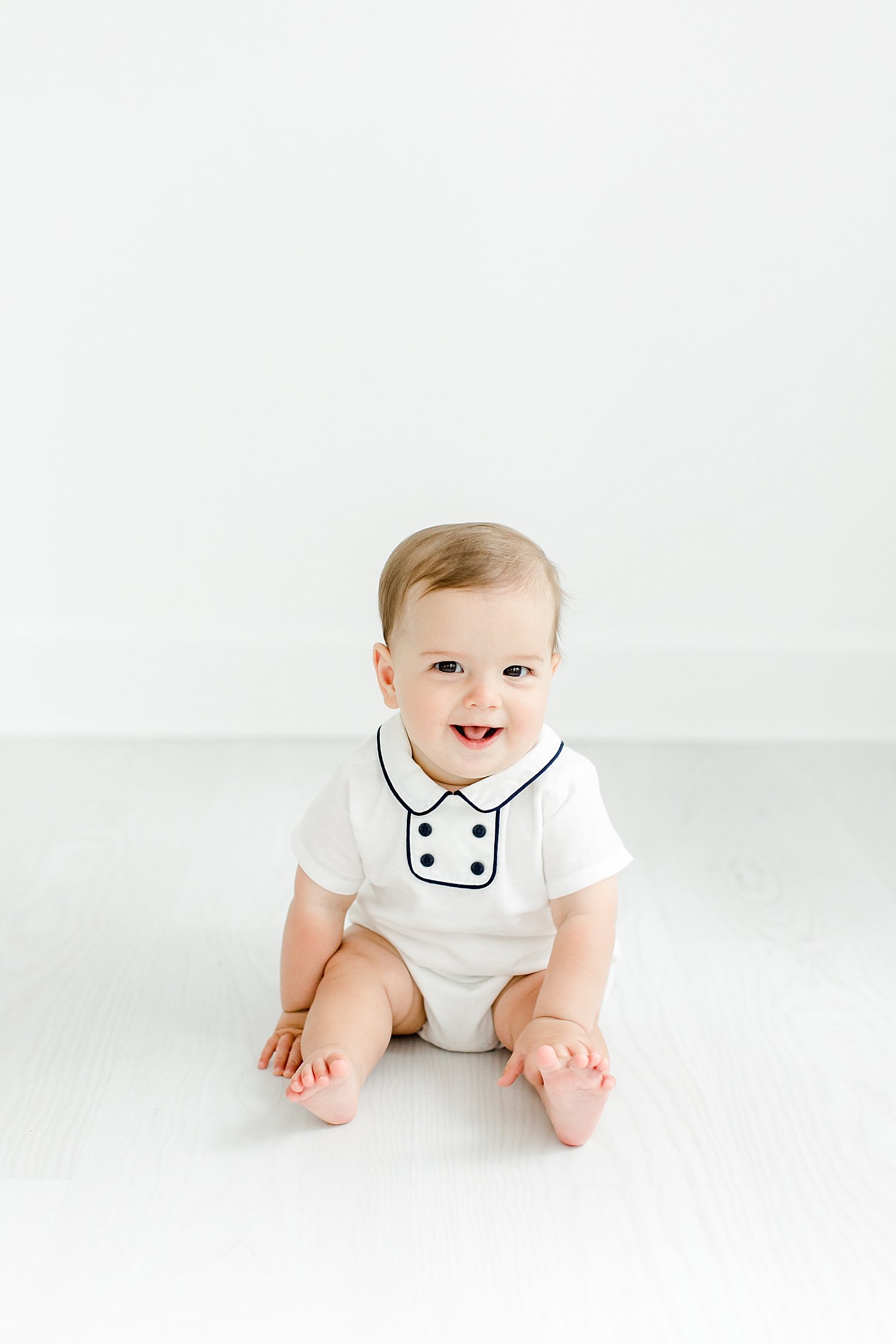 Children's portrait of eight month old. Photo by Kristin Wood Photography.