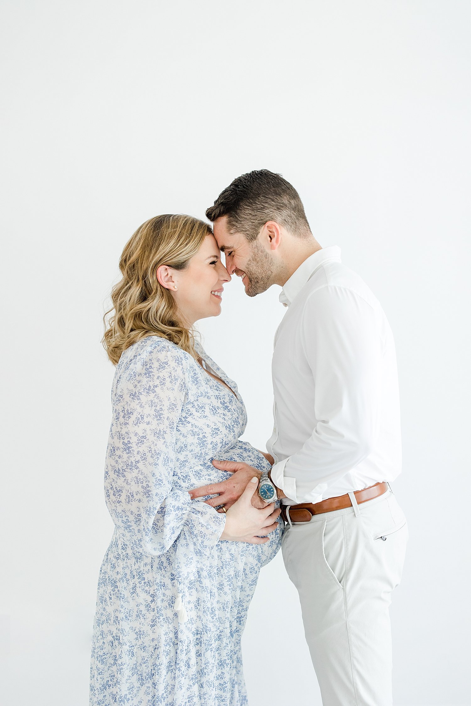 Studio and Sunset Beach Maternity Session With Expecting Parents