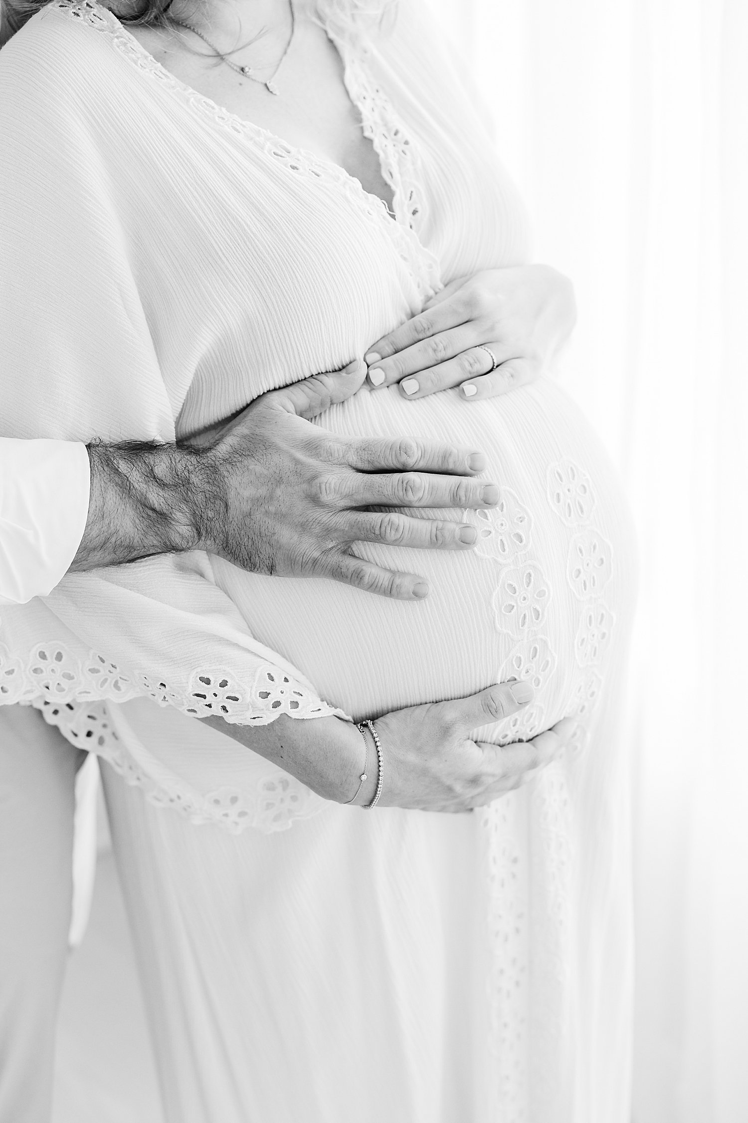 Black and white maternity photos of Mom and Dad | Kristin Wood Photography