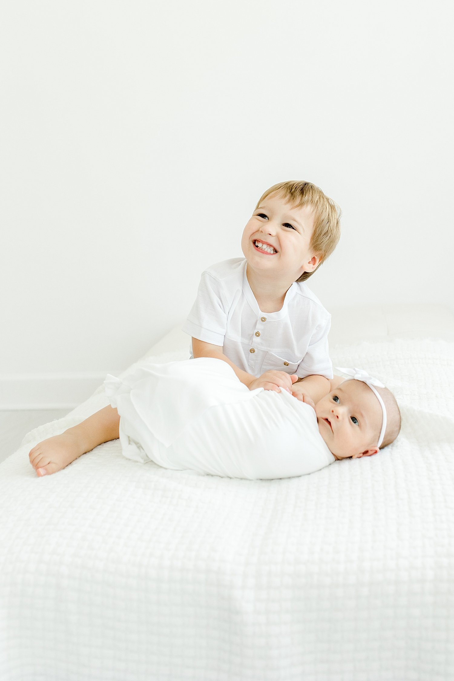 Sibling photos during newborn session in Westport, CT studio | Kristin Wood Photography