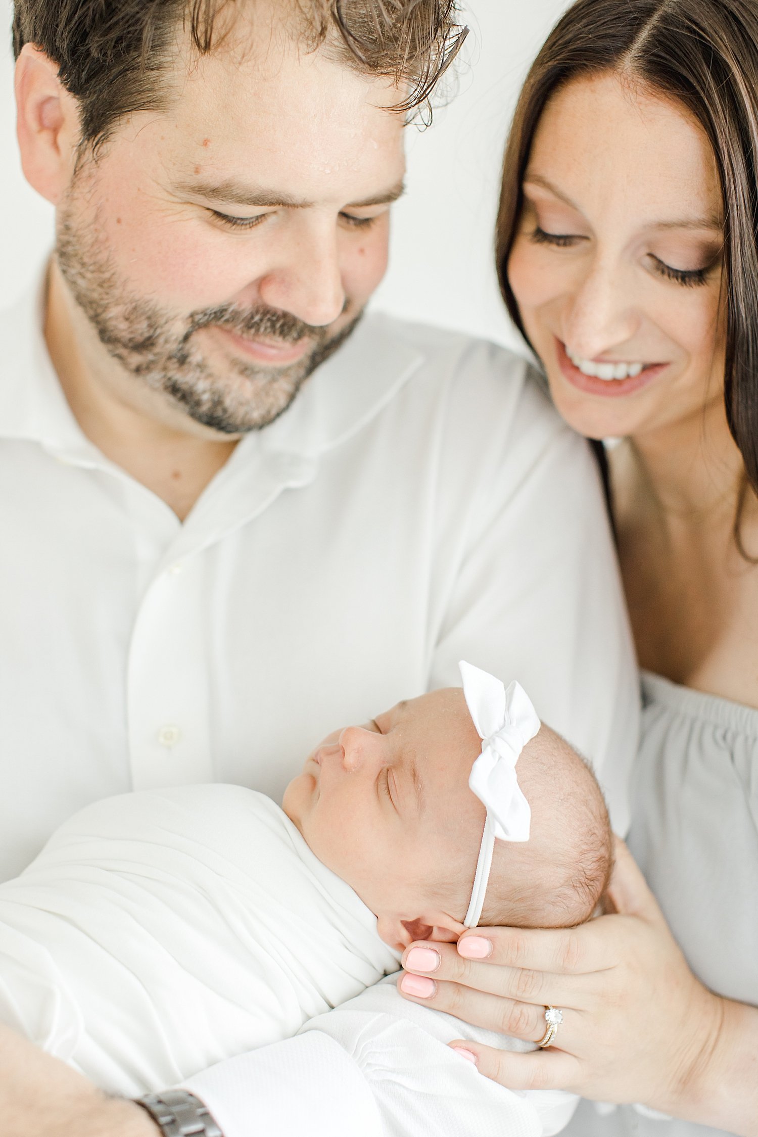 Mom and Dad with newborn daughter | Kristin Wood Photography