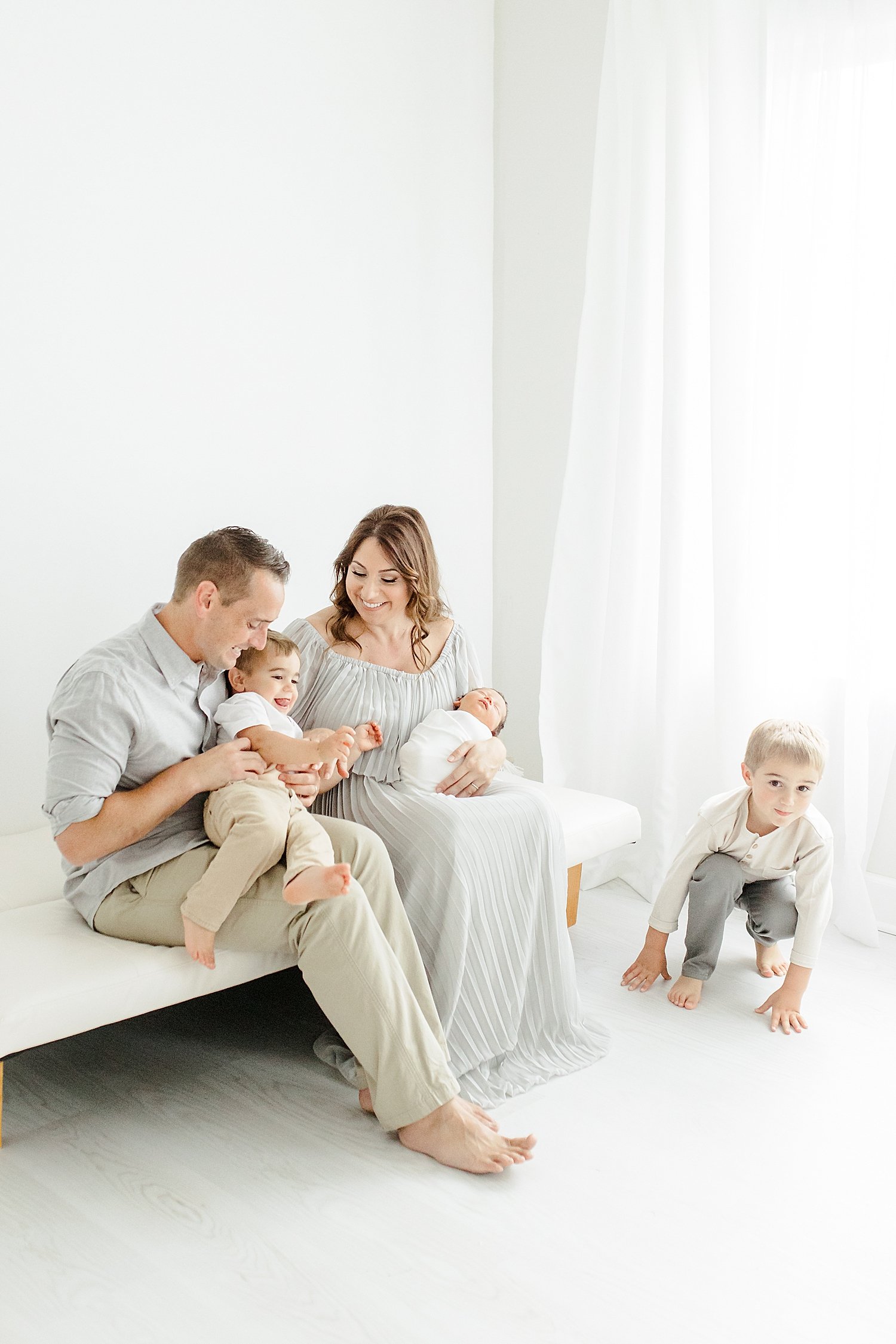 Mom and Dad with their three boys | Kristin Wood Photography