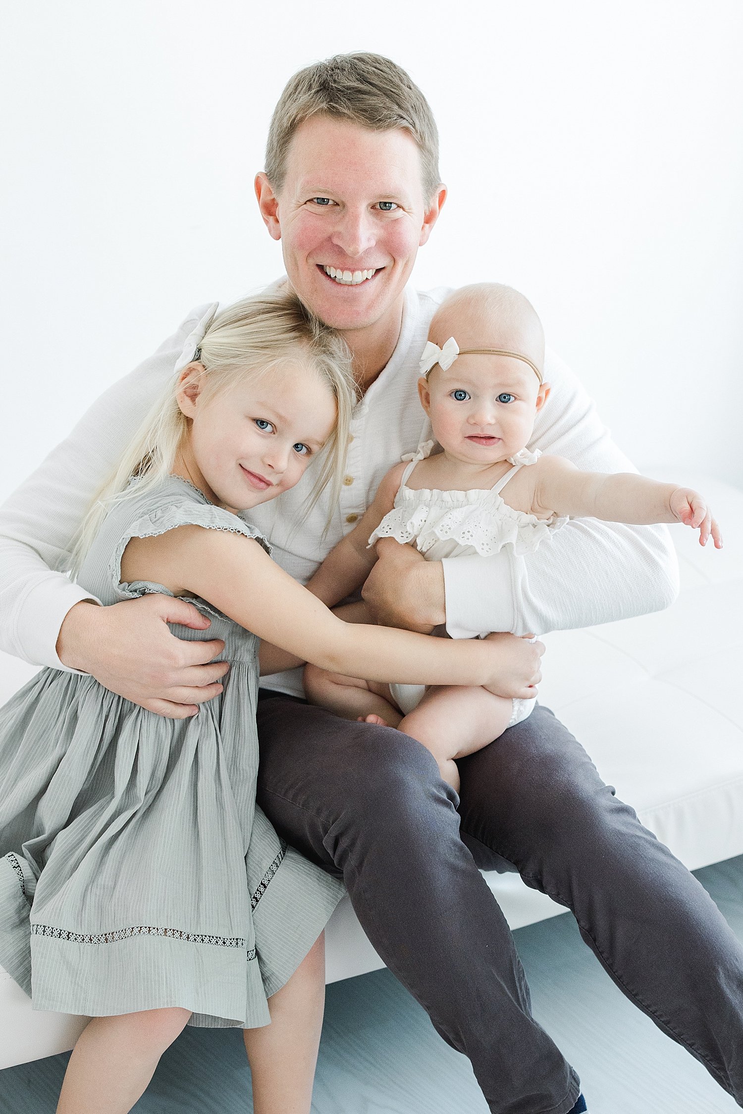 Dad with his two girls | Kristin Wood Photography