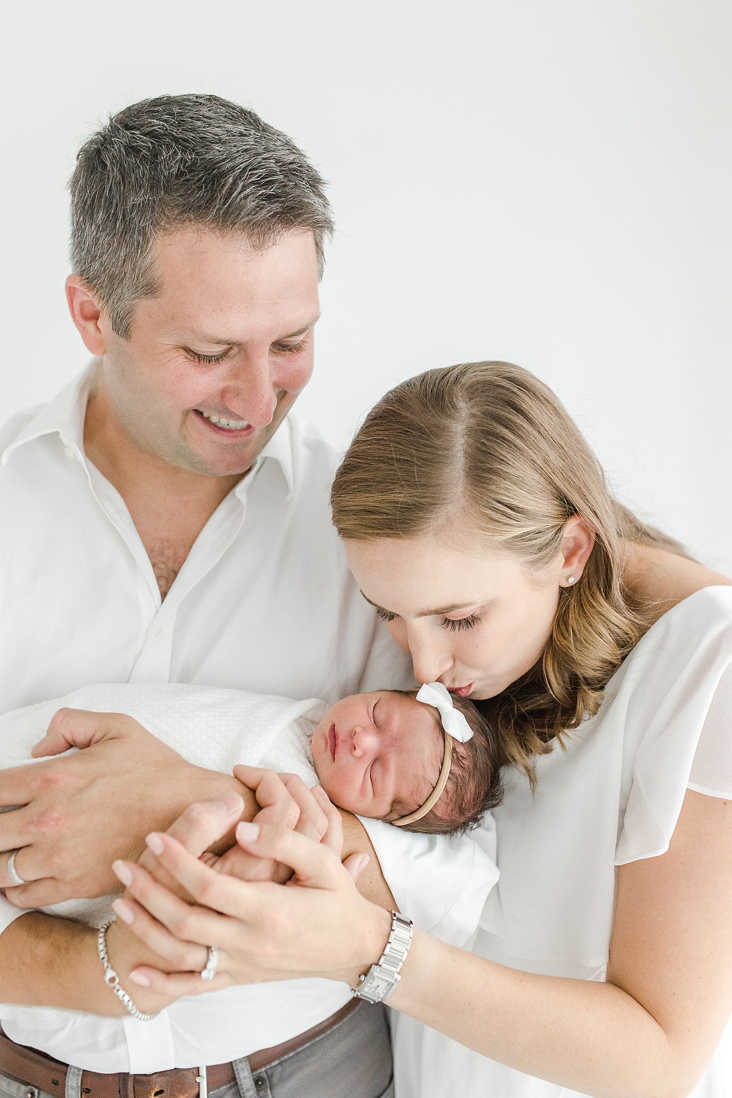 Mom and Dad with baby girl | Kristin Wood Photography