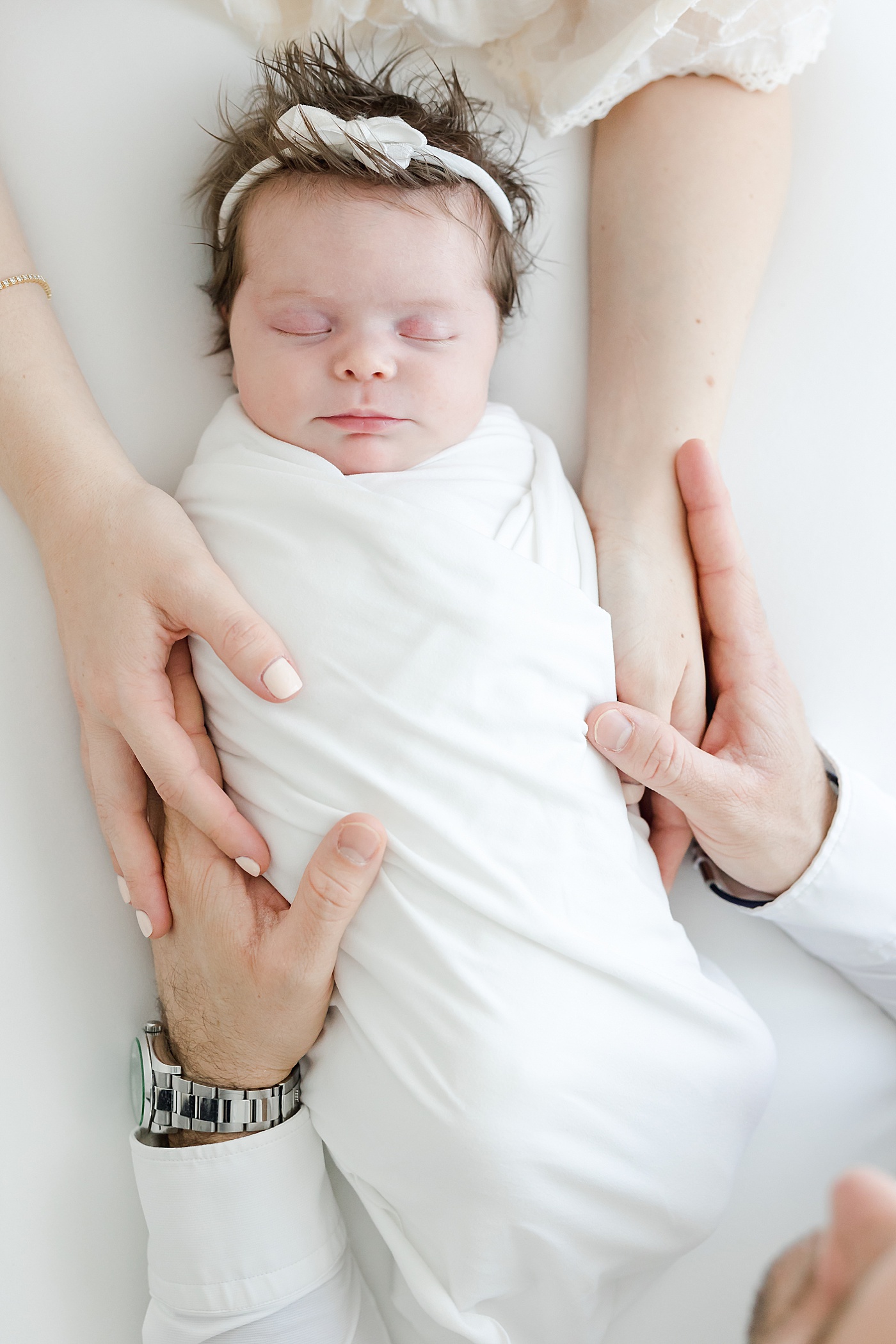 Mom and Dad with newborn daughter | Kristin Wood Photography