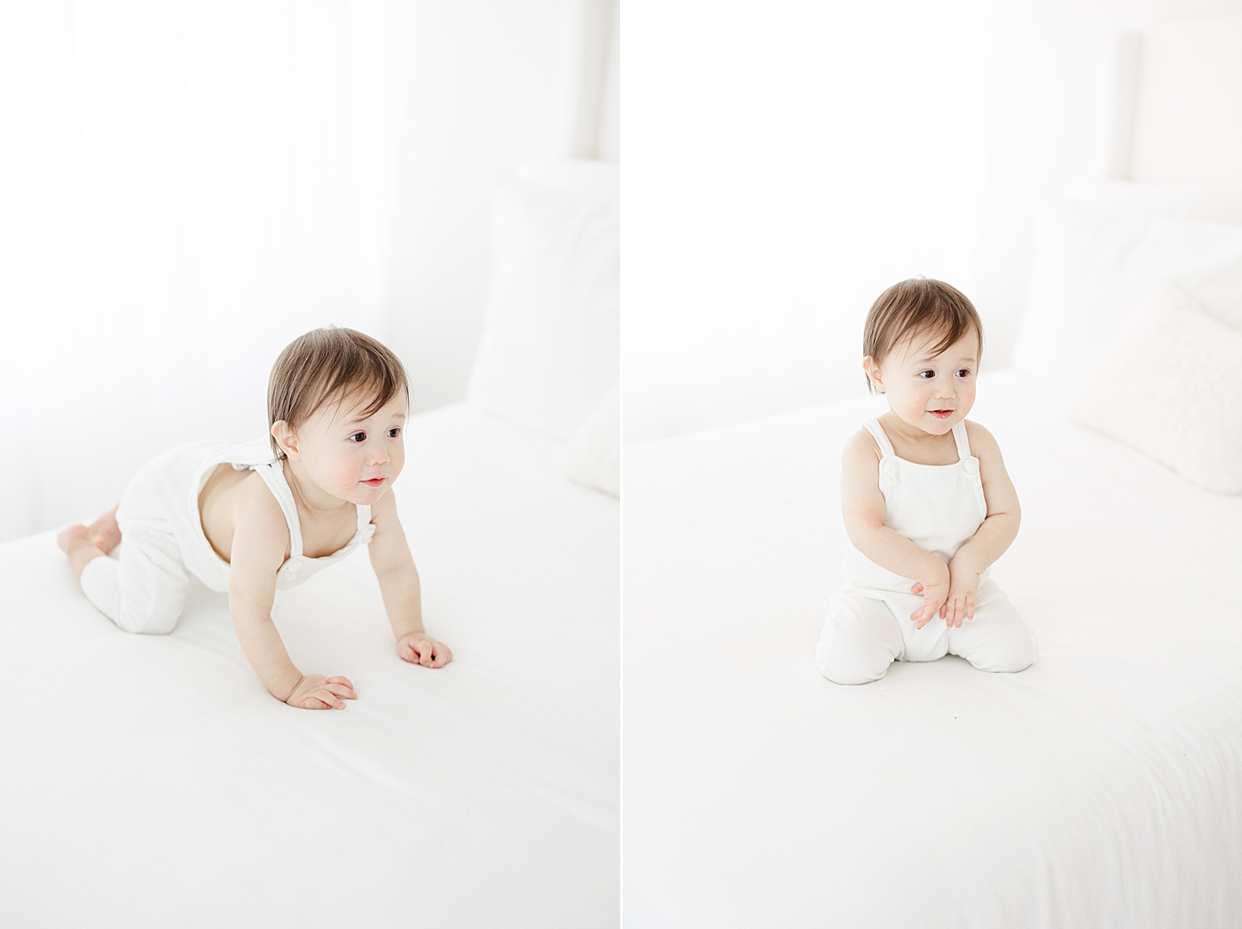 One year old playing on bed during first birthday photoshoot with Kristin Wood Photography.
