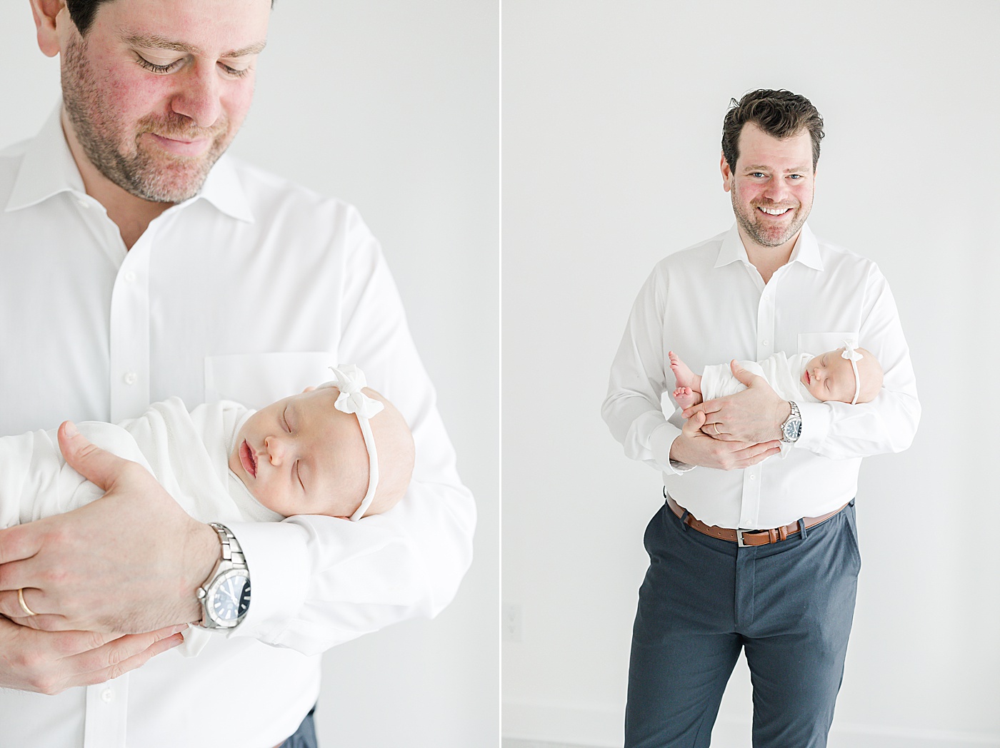 Dad holding newborn daughter | Kristin Wood Photography