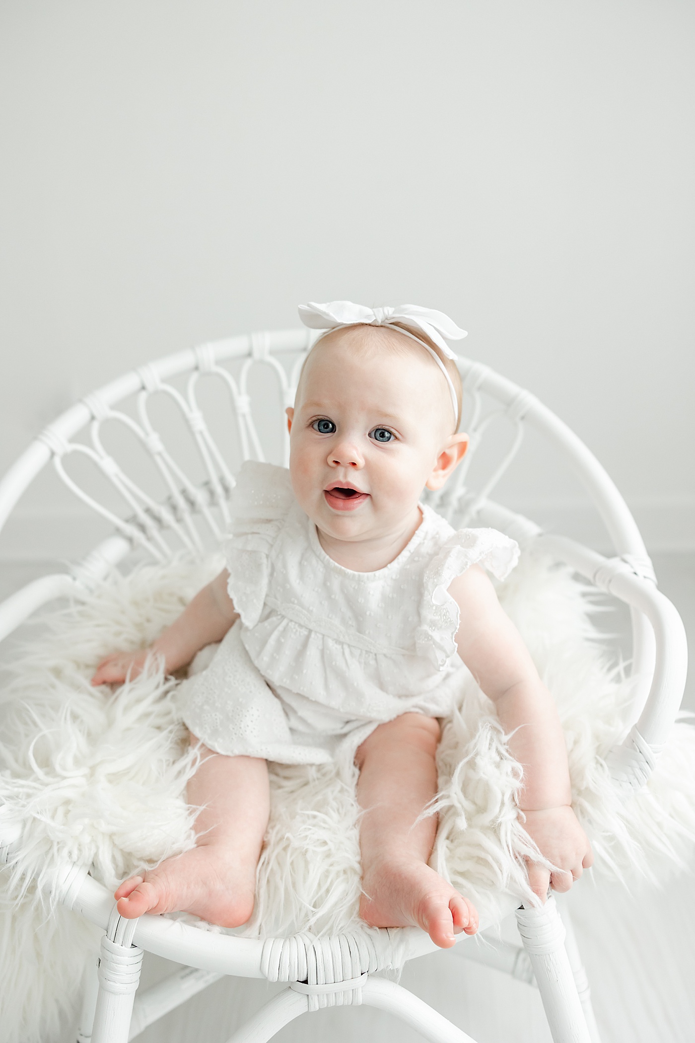 7 month old in studio for photoshoot with Kristin Wood Photography.