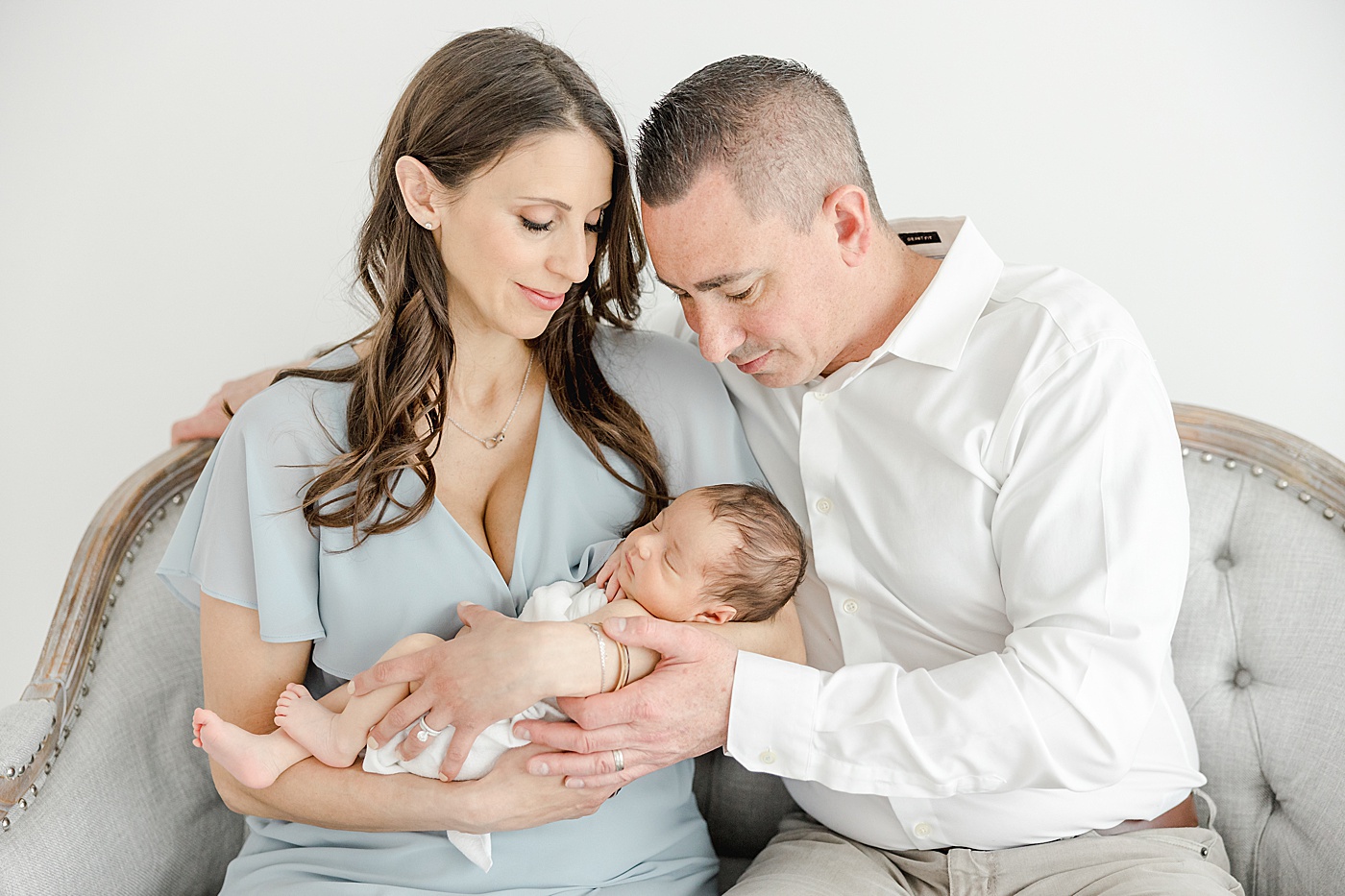 Studio newborn photos for parents and baby boy with Kristin Wood Photography.